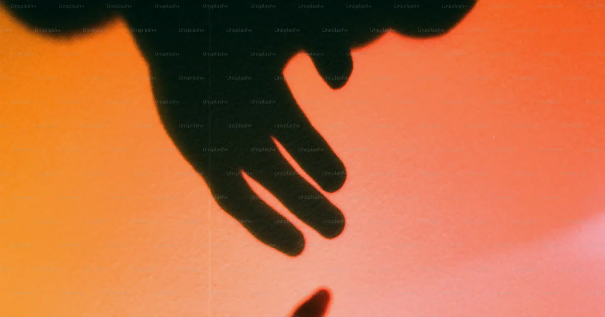 Shadow hands reaching towards each other in light. photo – Abstract ...
