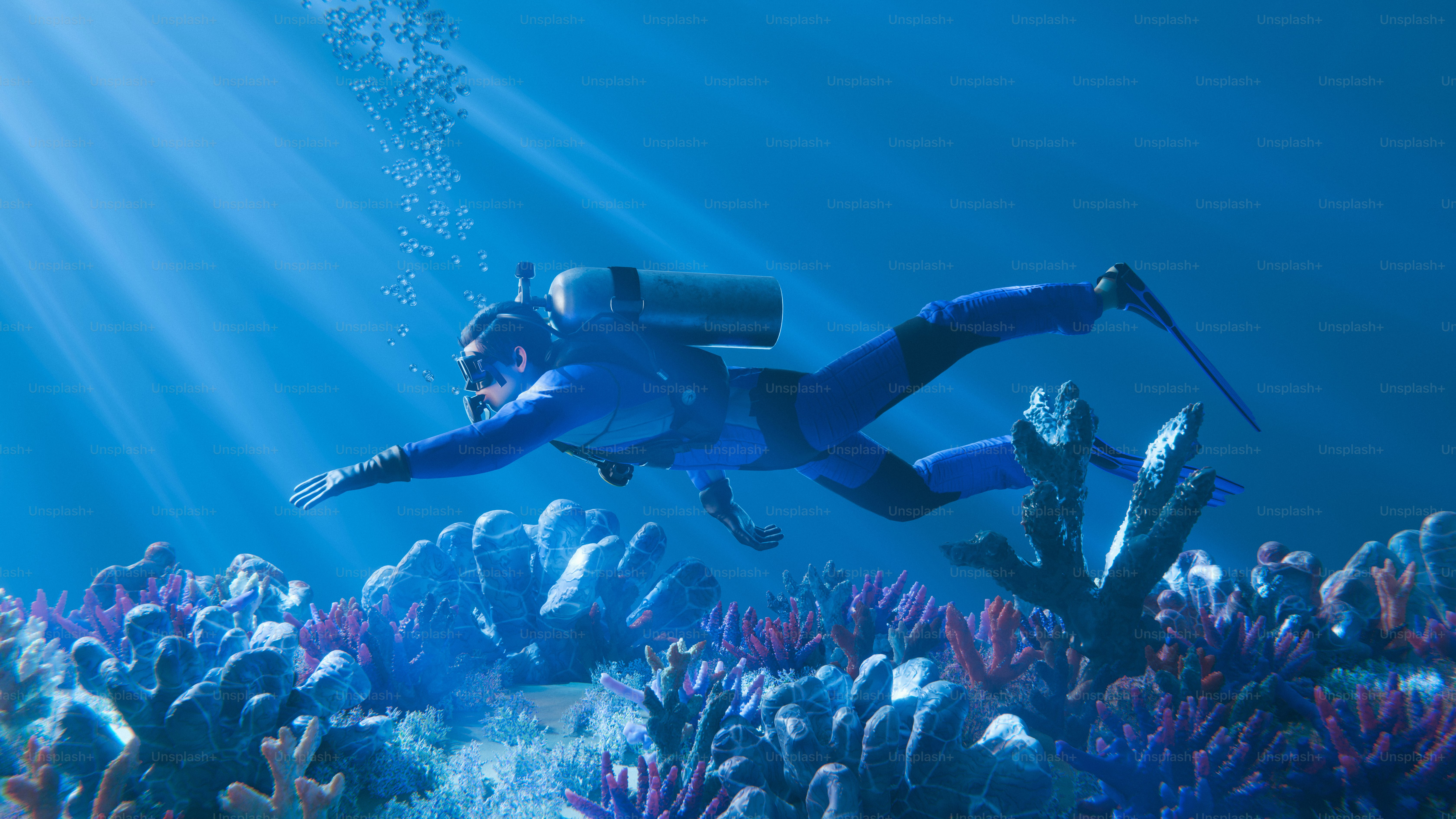 A scuba diver explores underwater coral reefs.