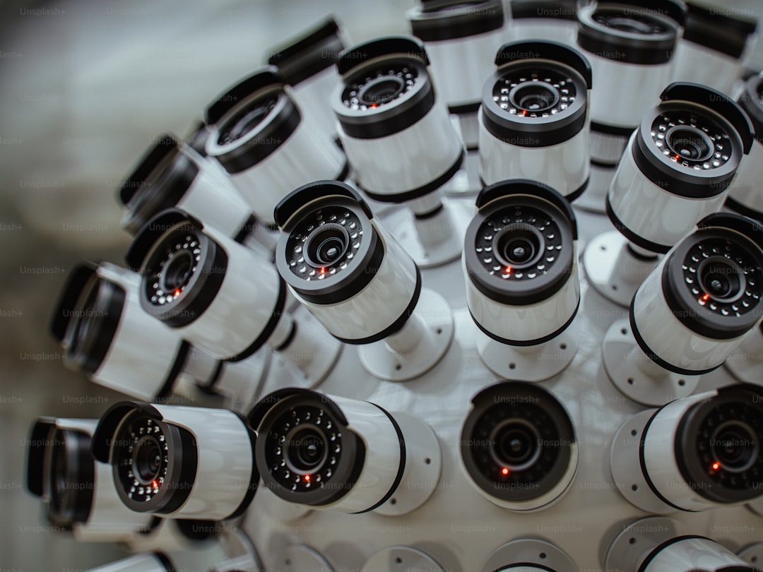 A sphere of surveillance cameras watches everything.