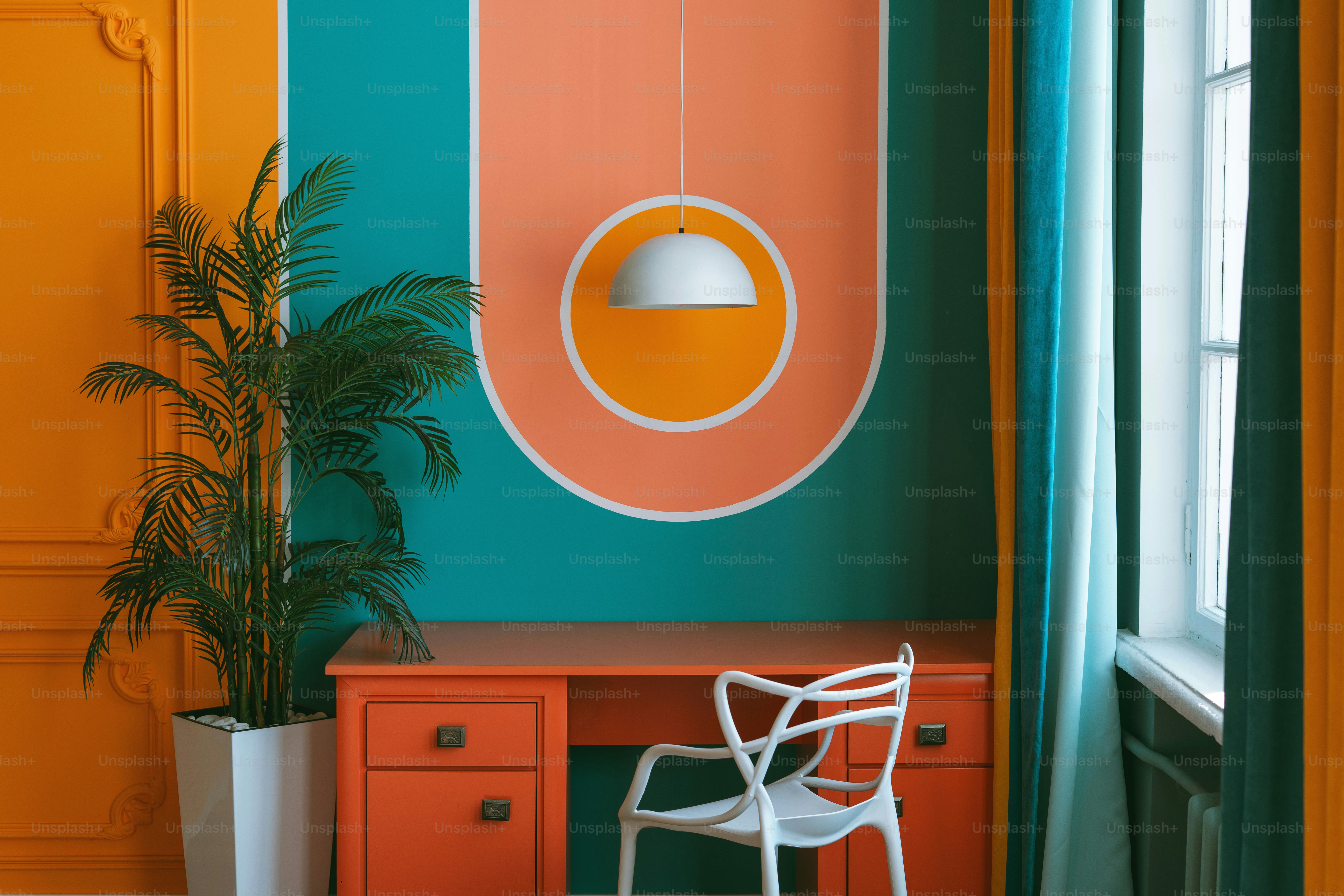 Brightly colored room with a desk and chair.