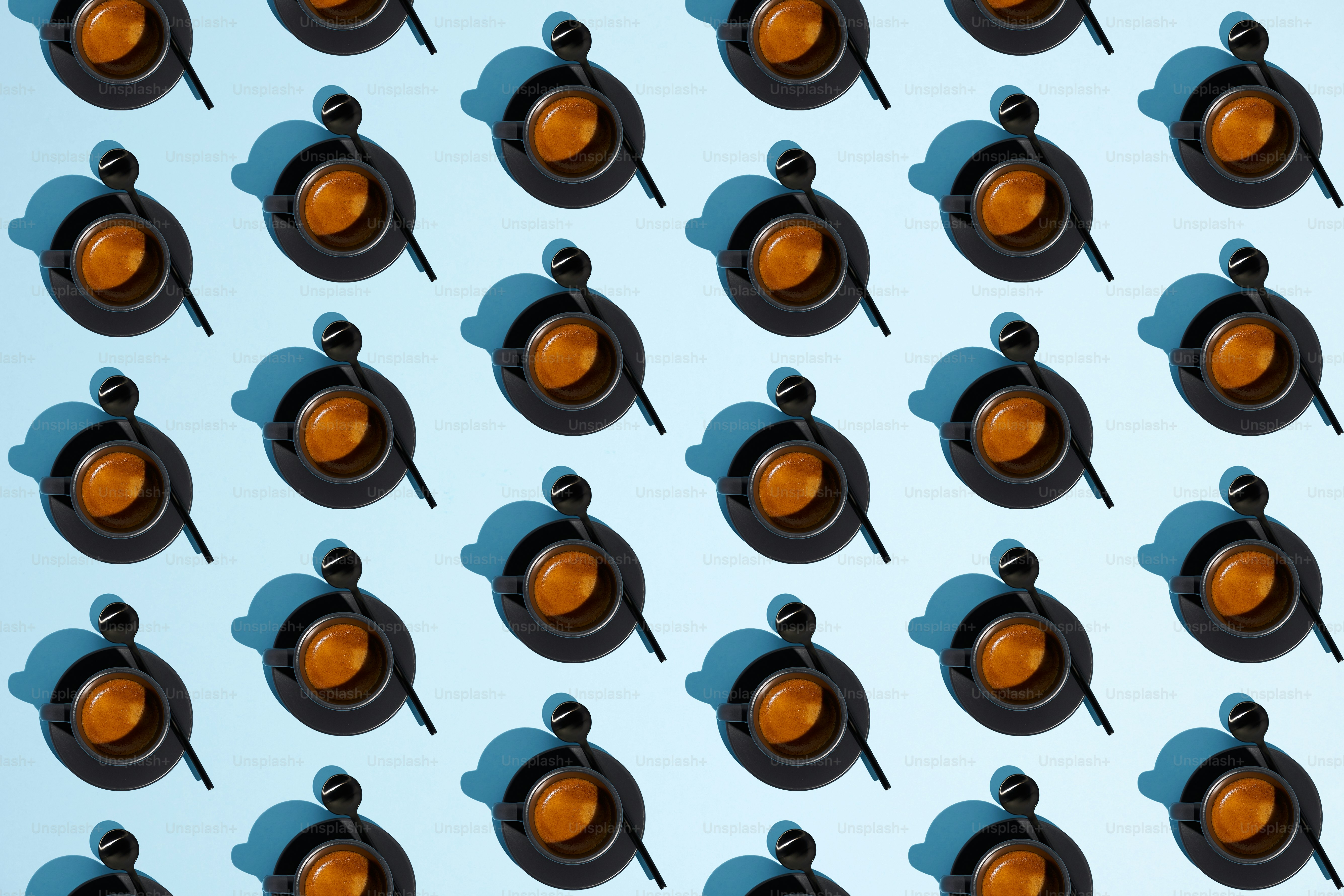 Many tiny, patterned coffee cups.