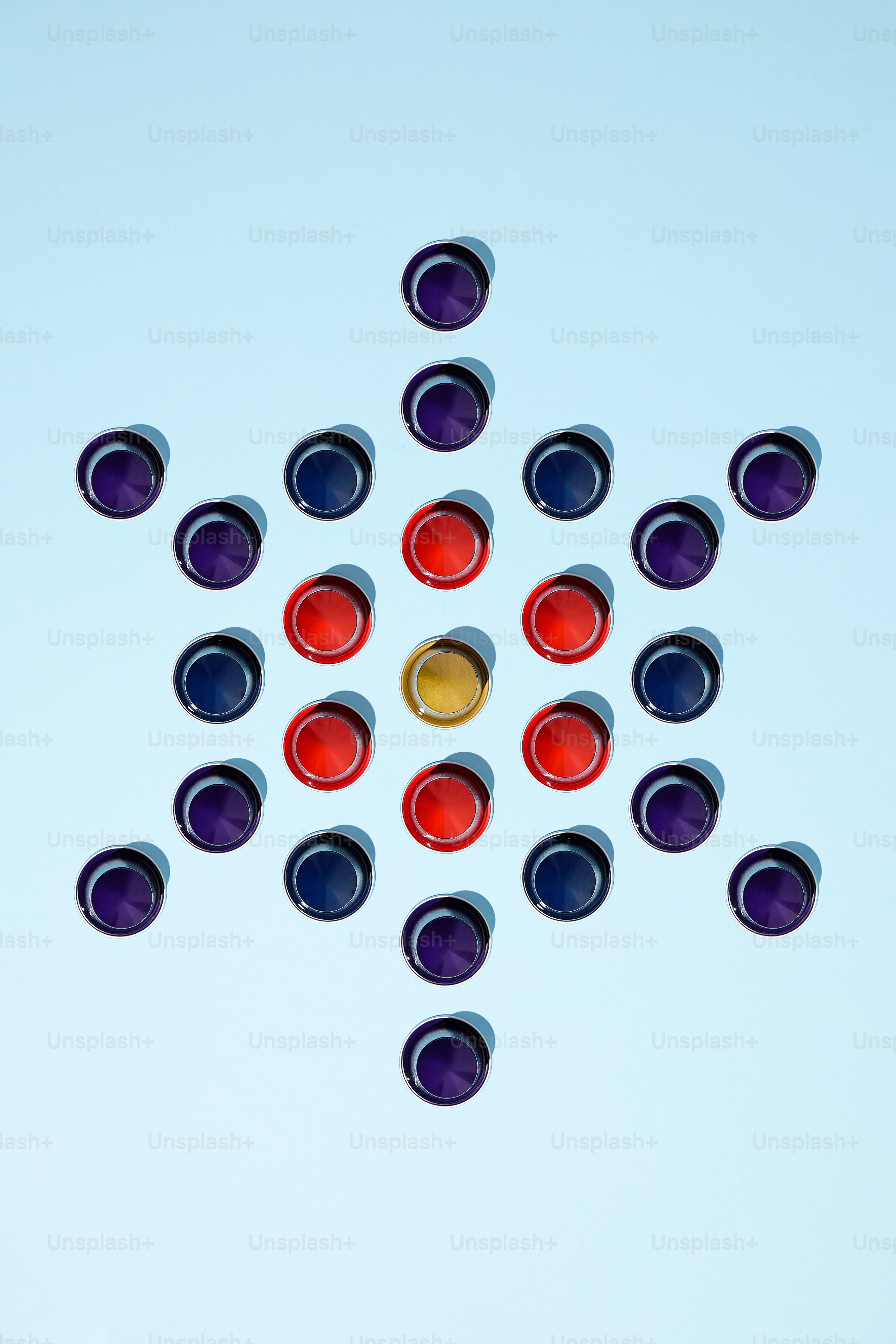 Colorful containers arranged in a star-like formation.