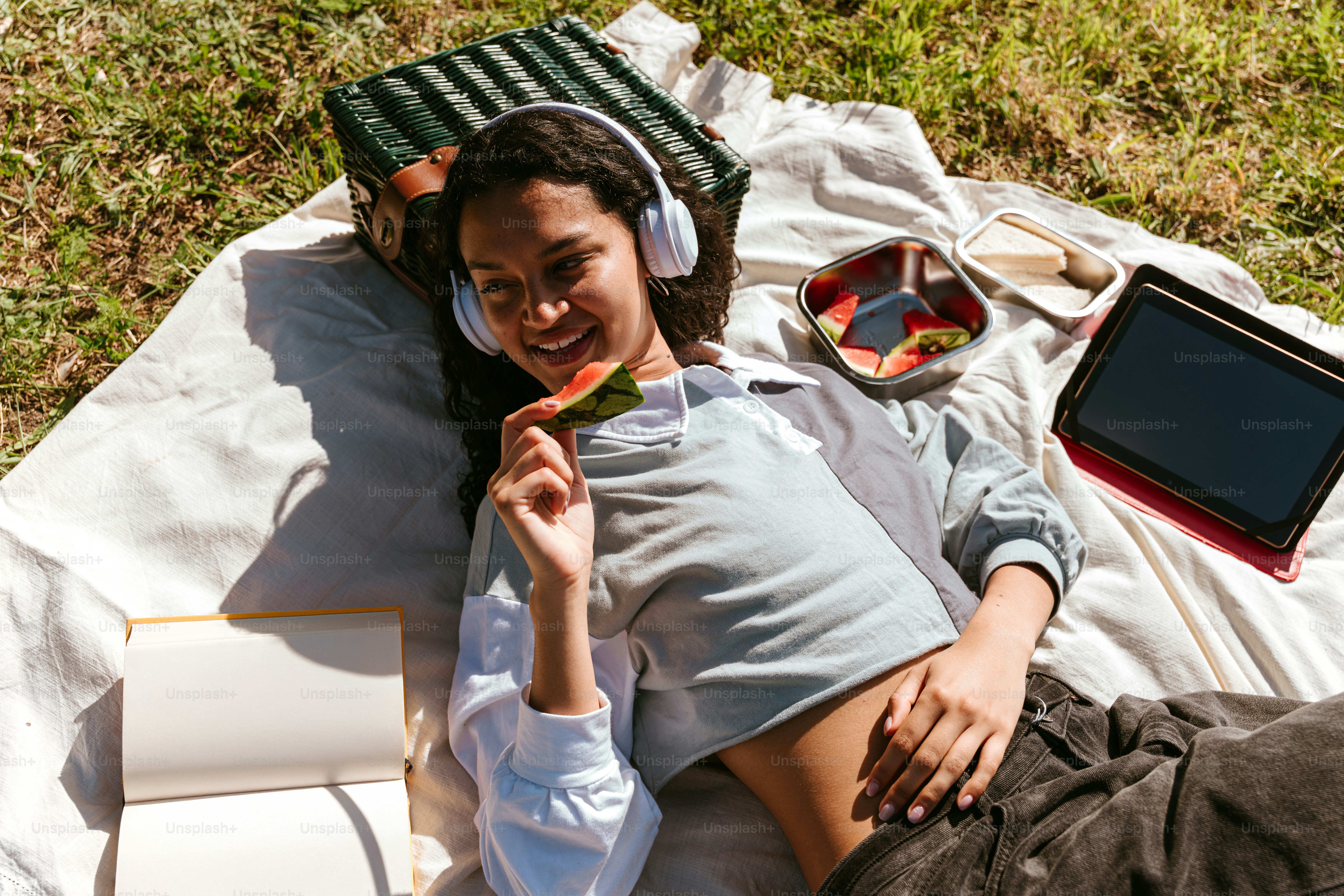 Woman works on her laptop while at the beach. photo – Beach Image on ...