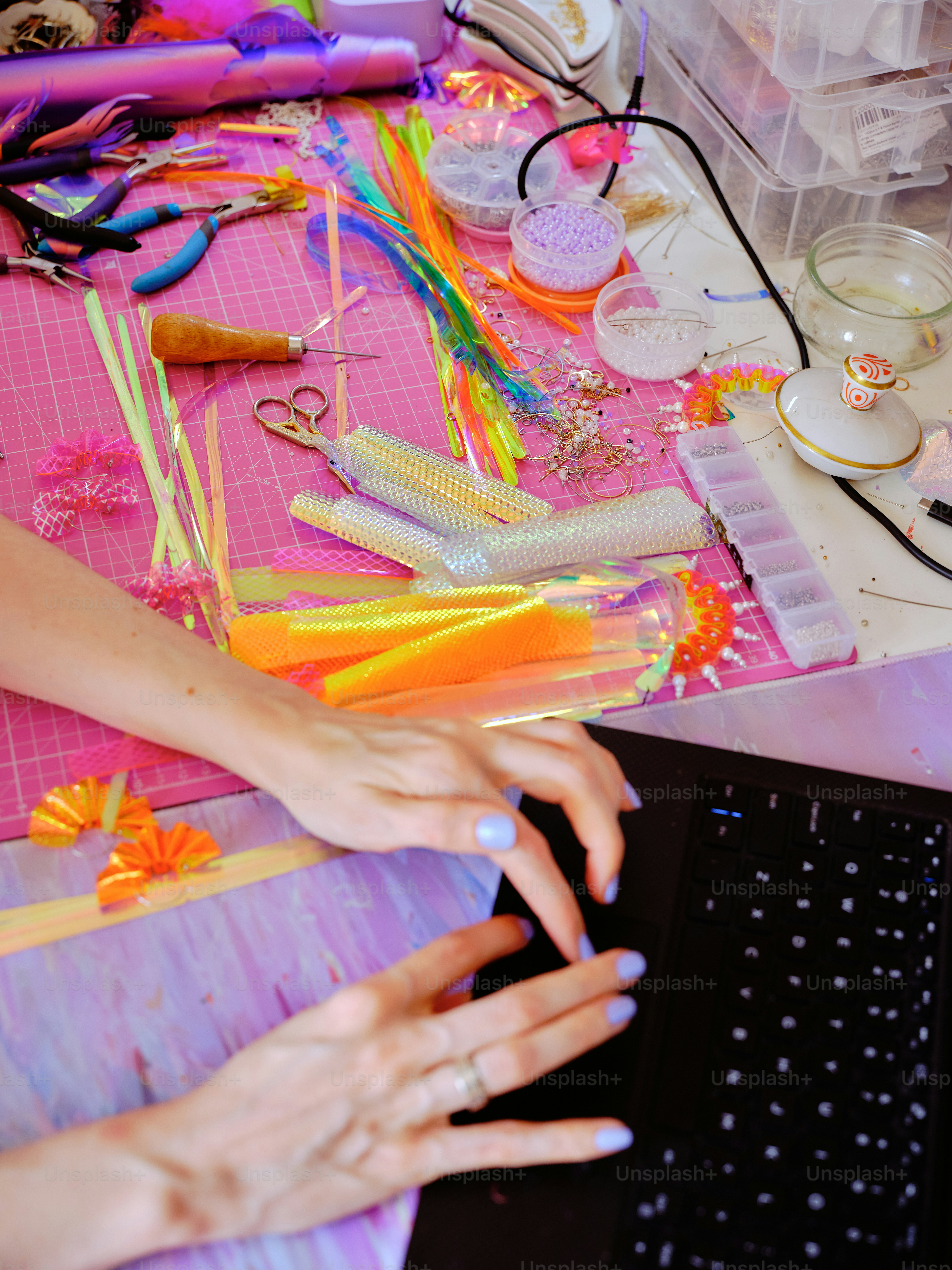 Collection of cheap beginner nail art tools arranged on a manicure workspace