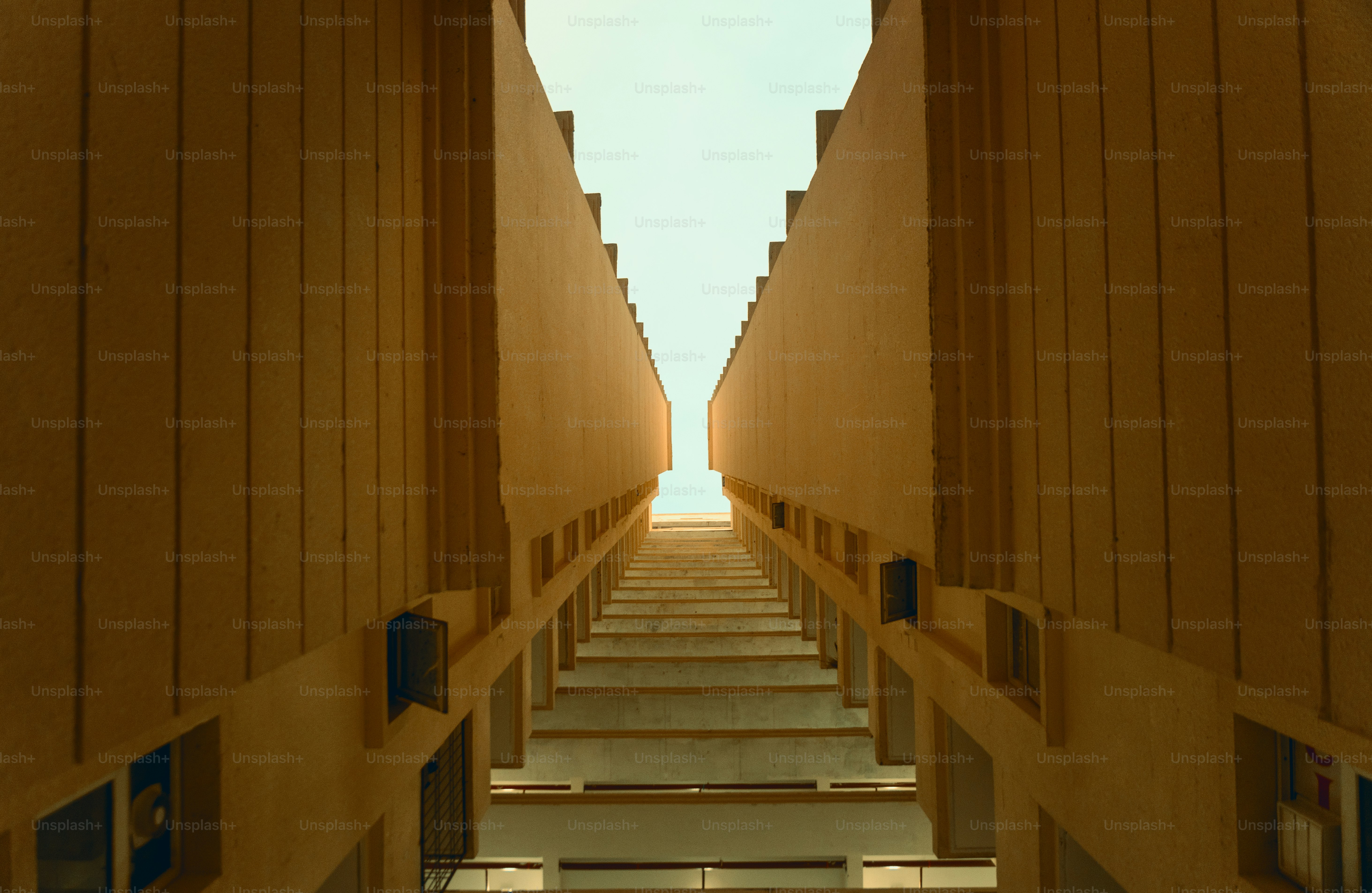 Looking up at a building's symmetrical interior.