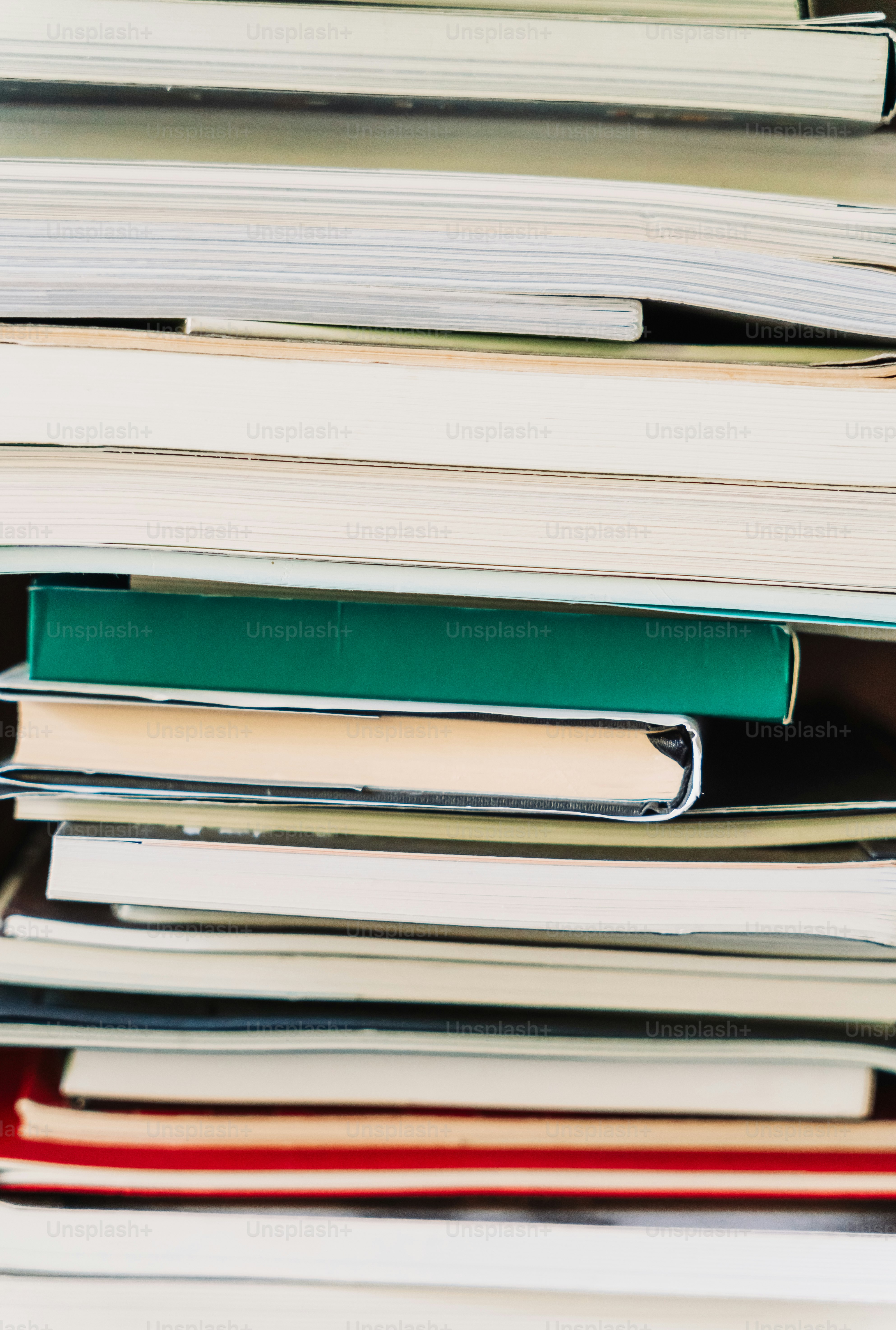 A stack of books and papers.
