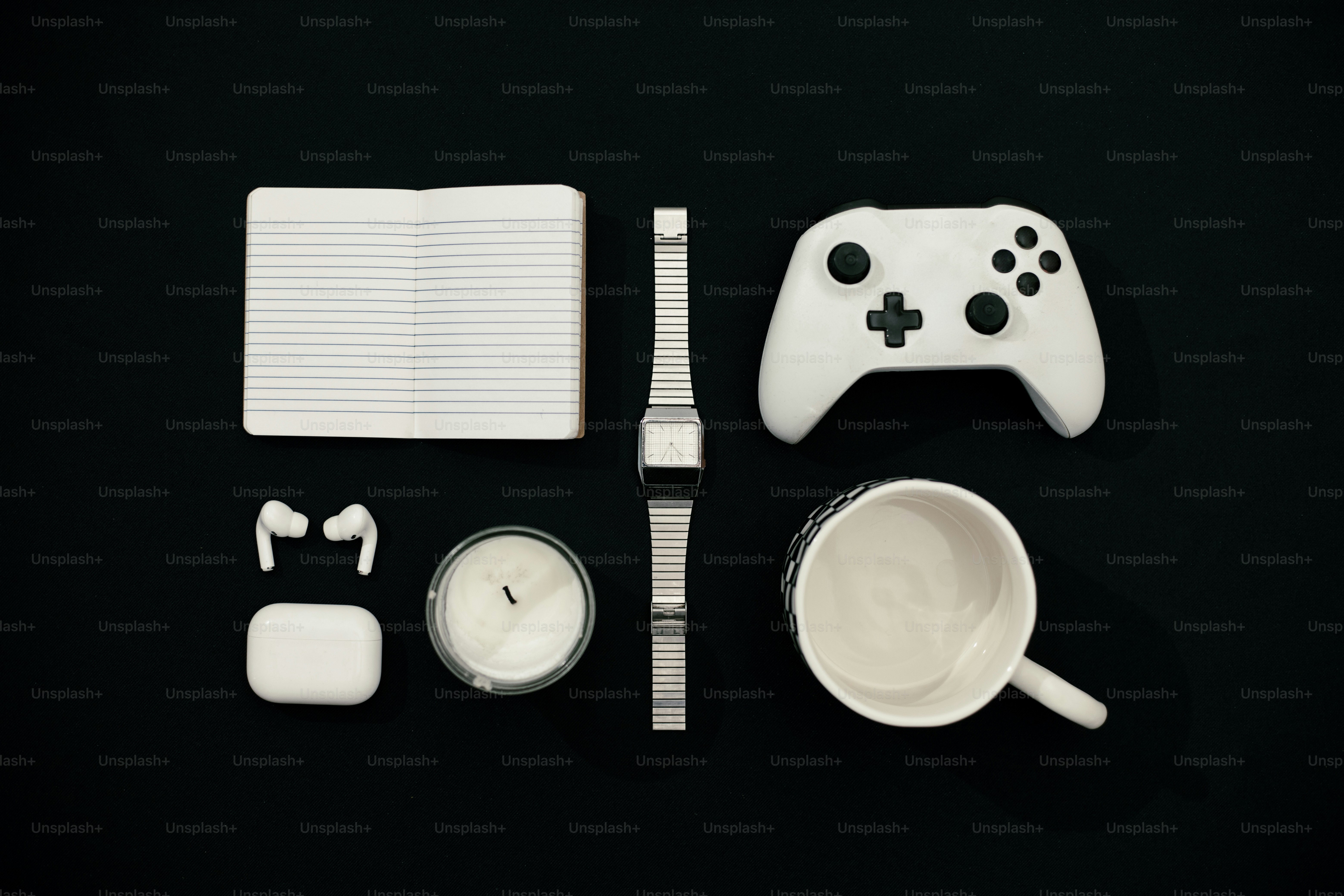 A gamer's essentials, neatly arranged in white.