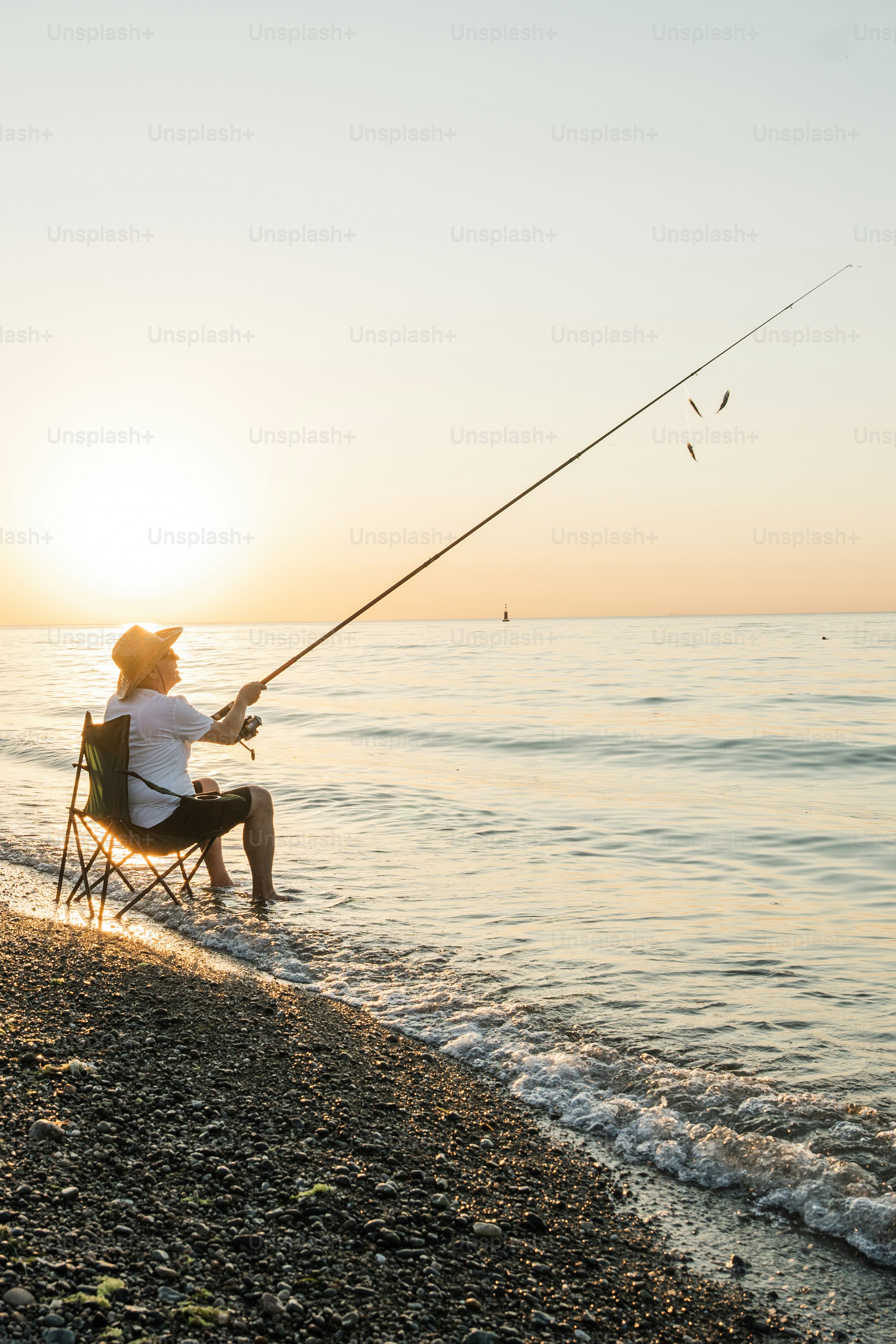 beach chair and fishing pole on beach JOYTUTUS Rod Holder & Rack Fit 31.5- 32.5 Diameter & 8.5- 9.6 Width Spare Tire for Capacity 5-Rod Fishing 4 Chair, No Remove Tire for Check compatibility before purchasing Back view of a senior,