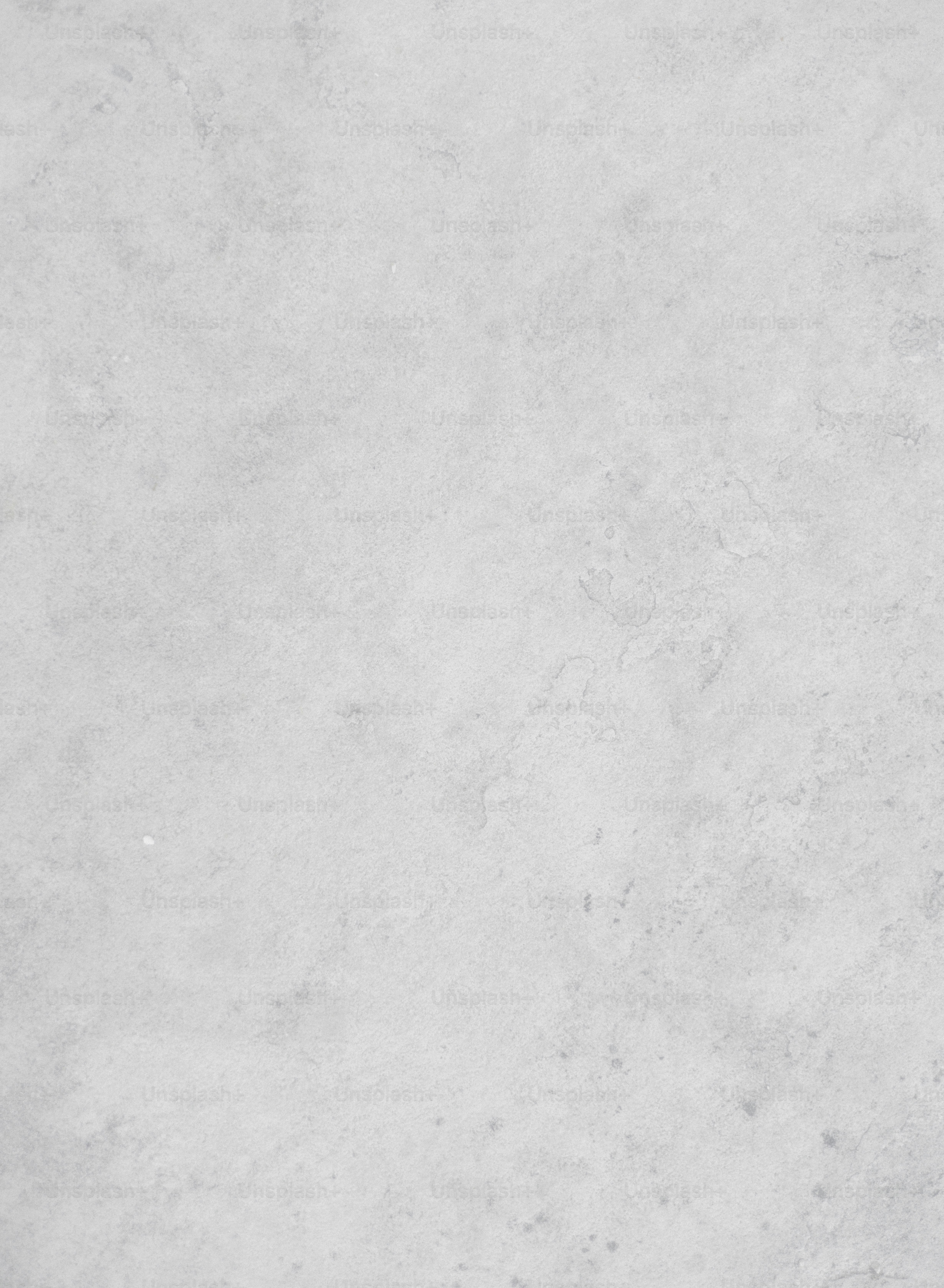 Gray, textured background fills the entire frame.