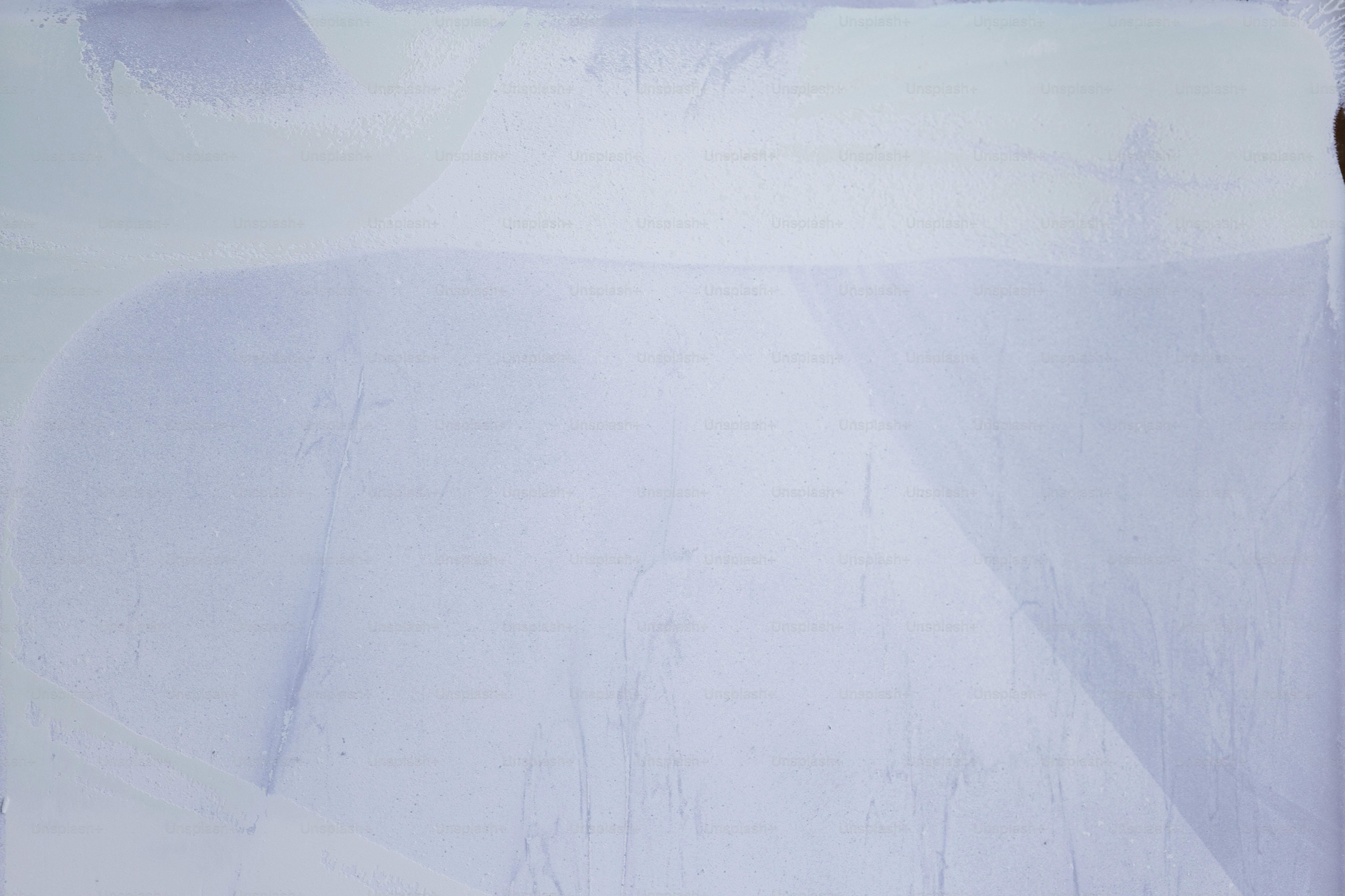 Abstract, blue and white shapes fill the frame.