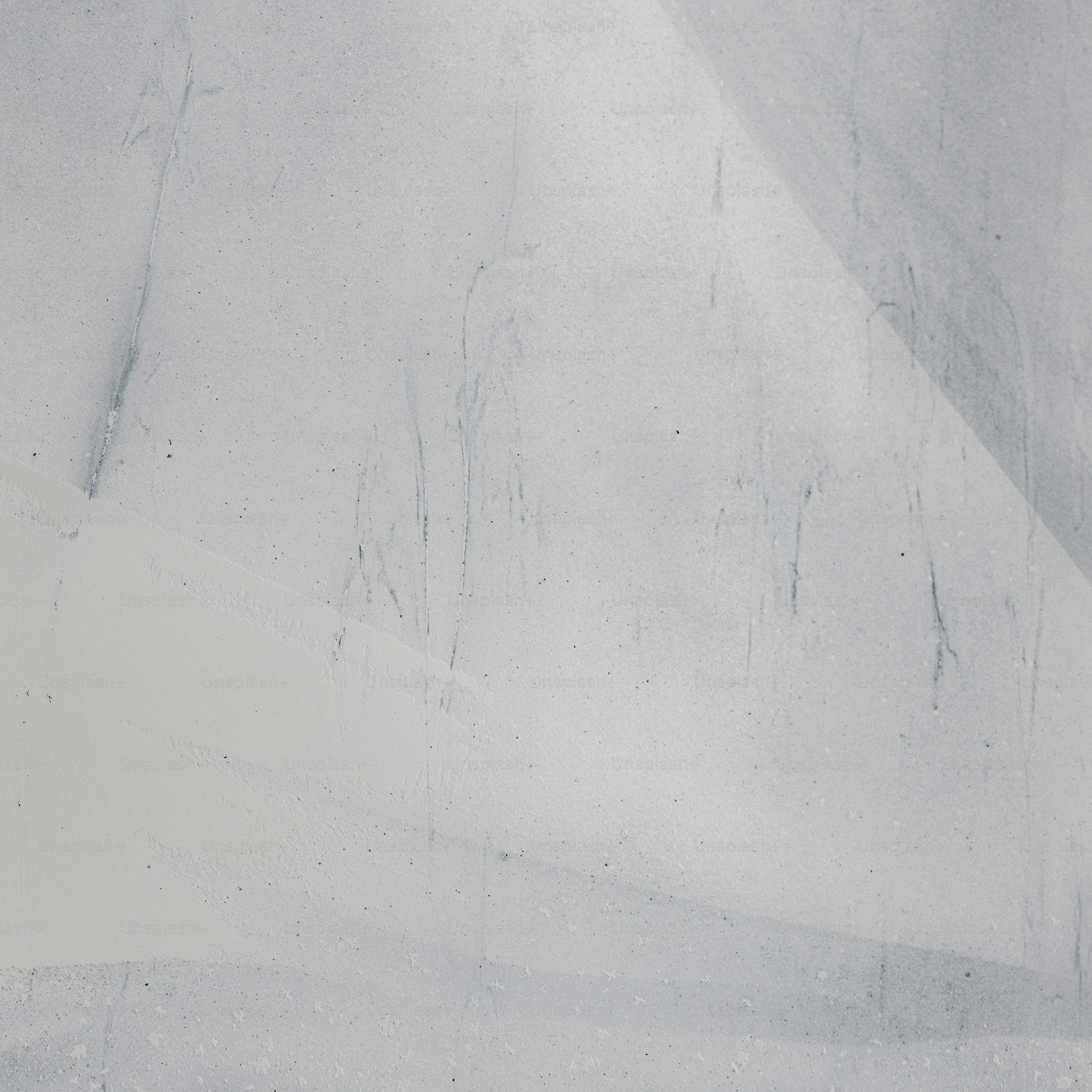 Abstract image of white, textured layers.