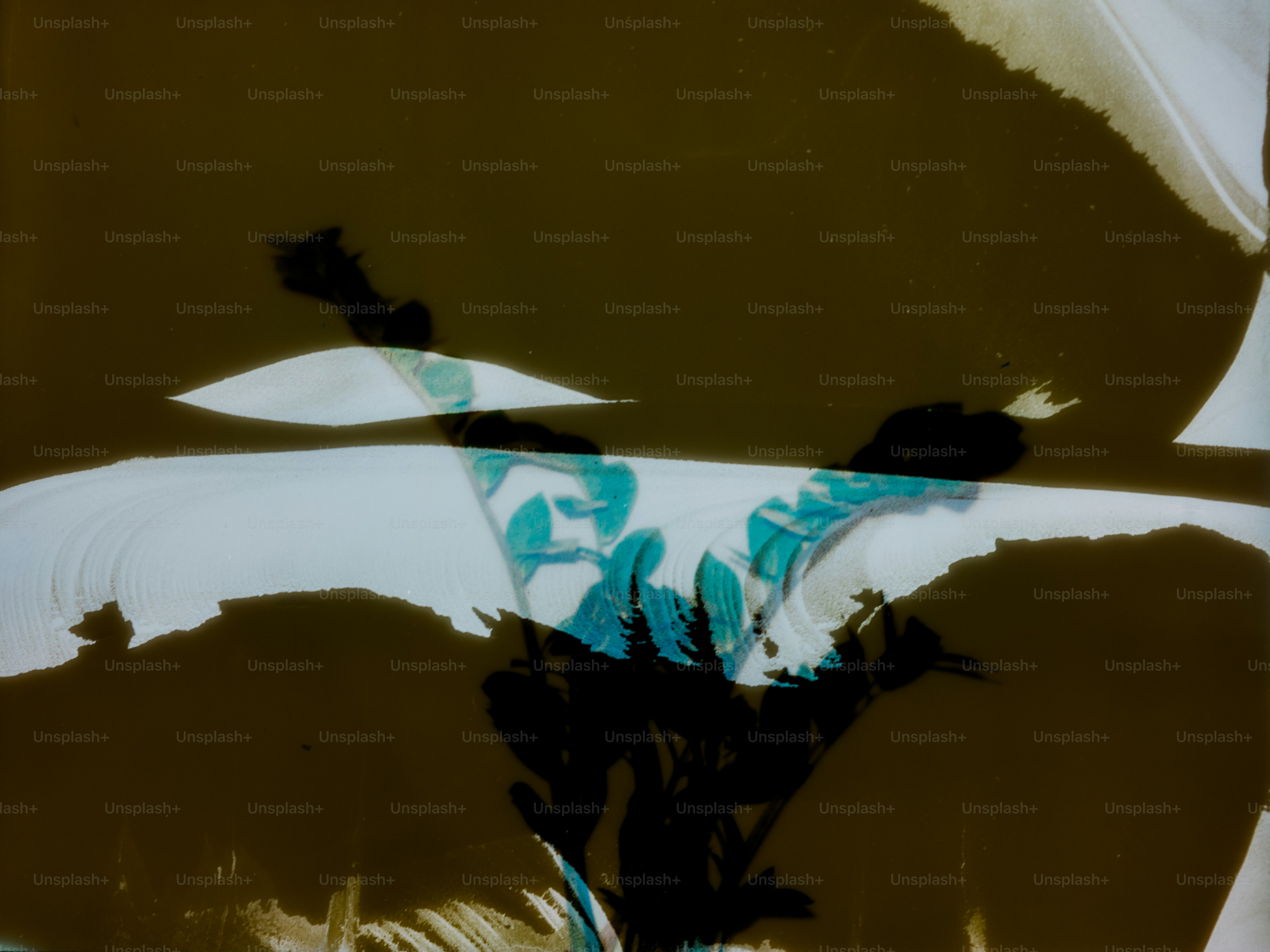 Abstract shapes and colors create a surreal landscape.