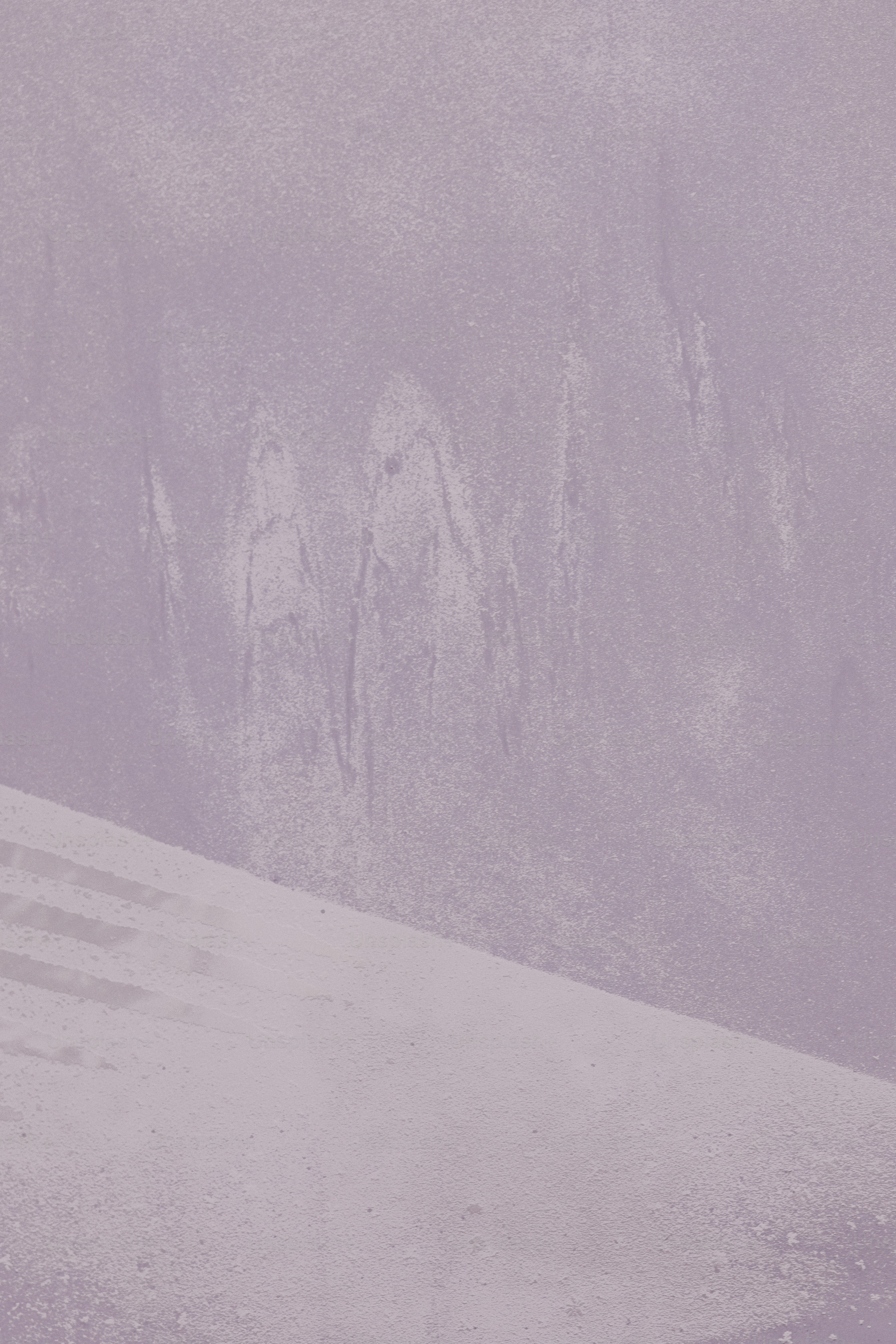 Abstract purple background with angled white shapes.