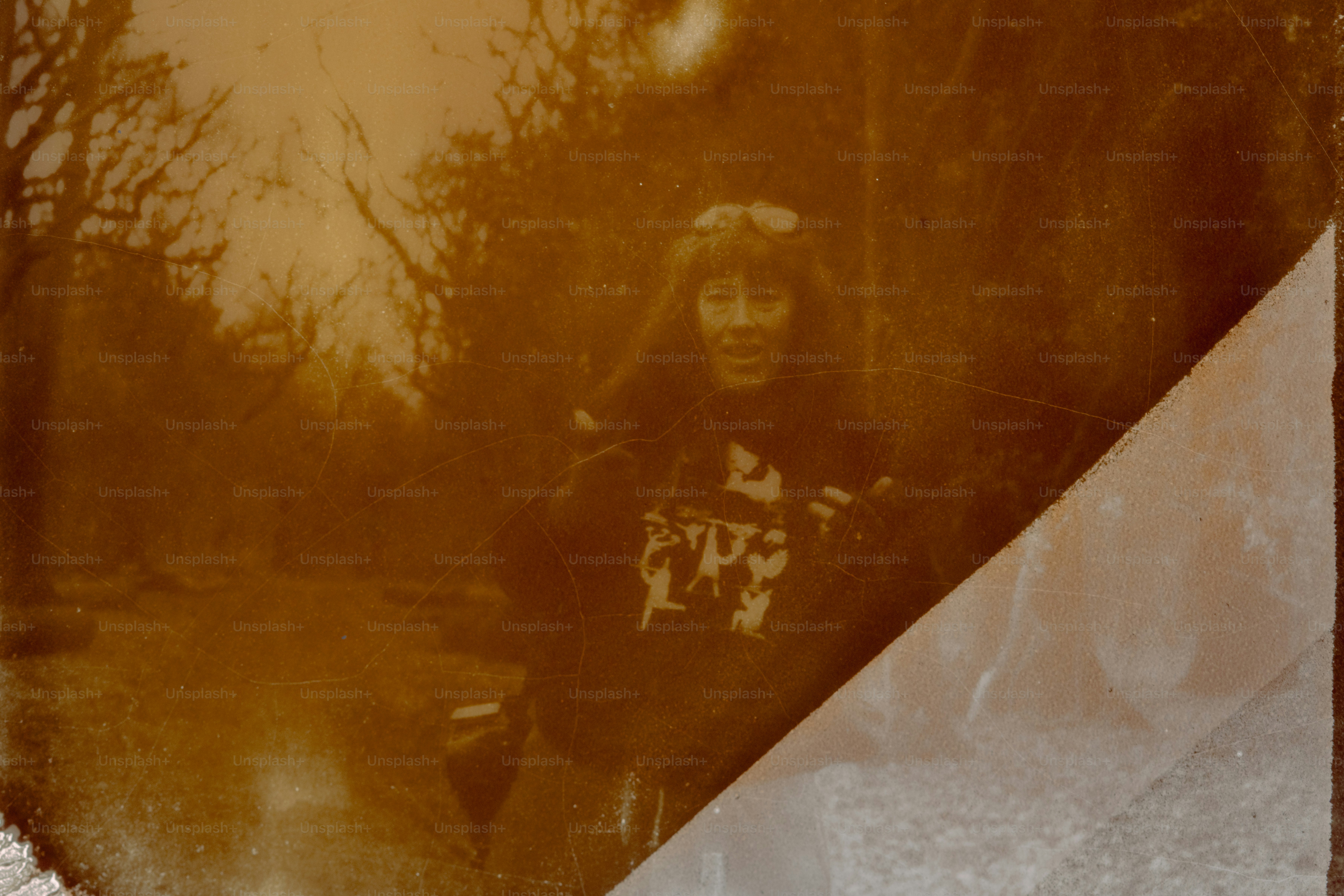 Woman poses on a path in the woods.