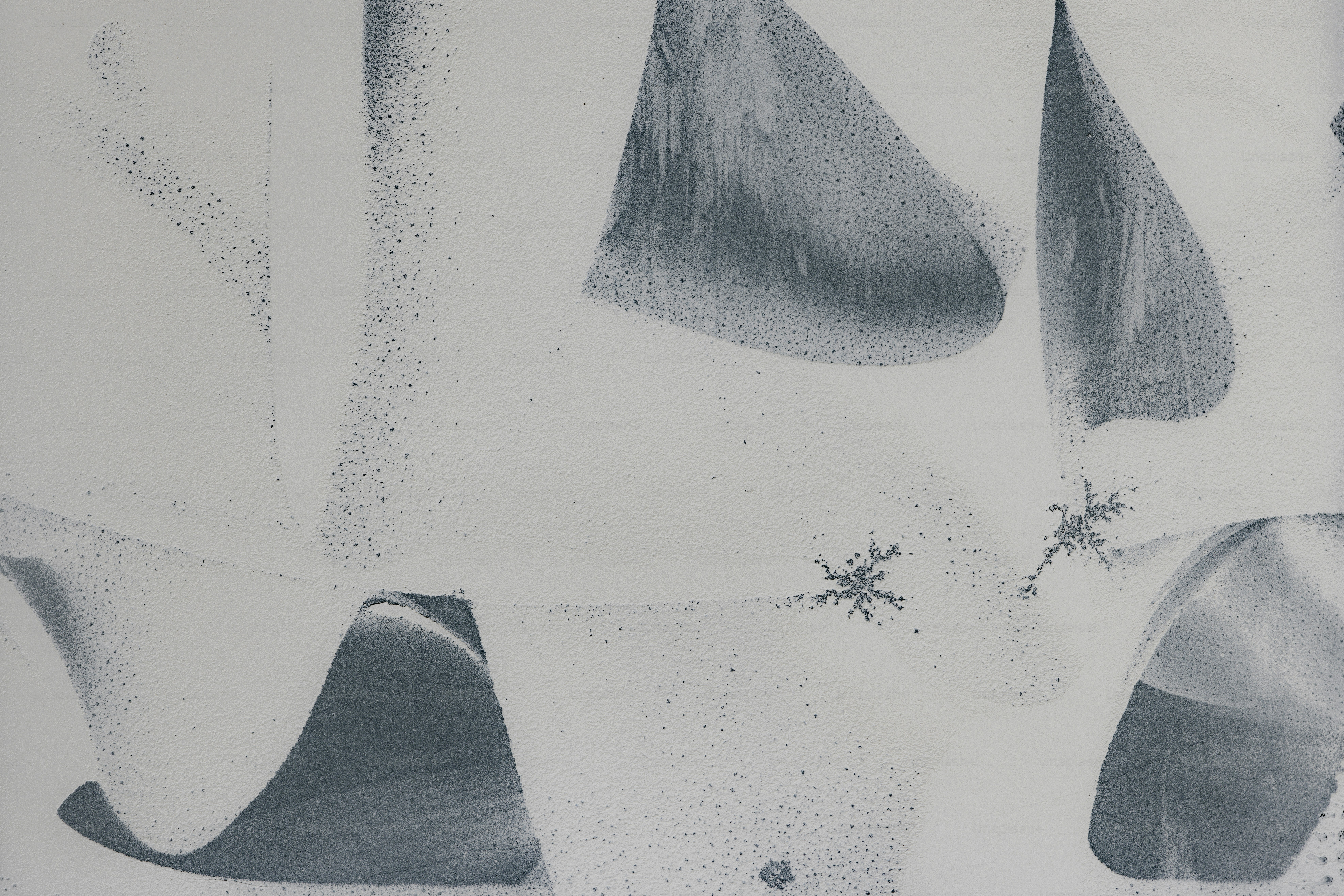 Abstract artwork with gray and white shapes