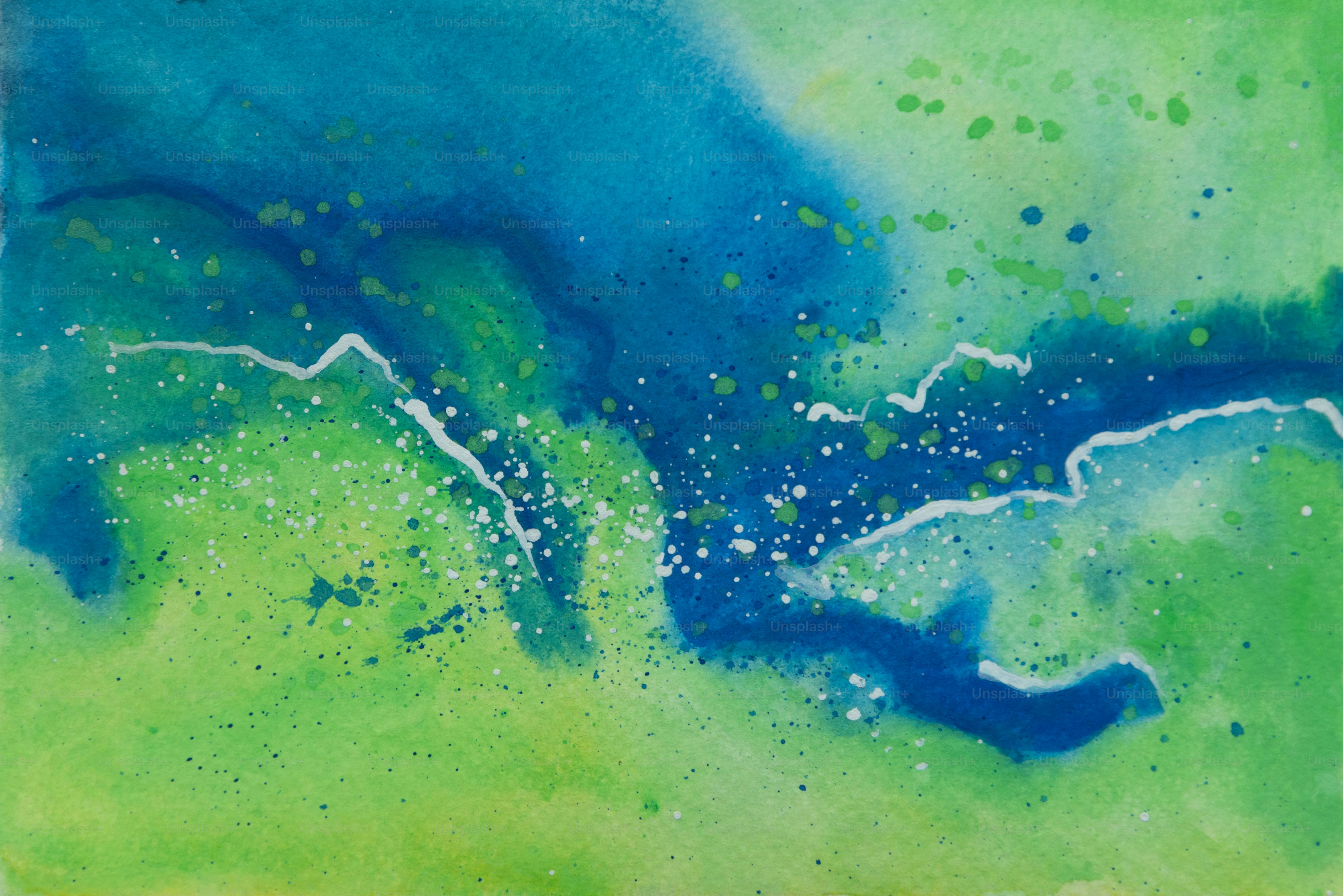 Watercolor abstract painting of blue and green.