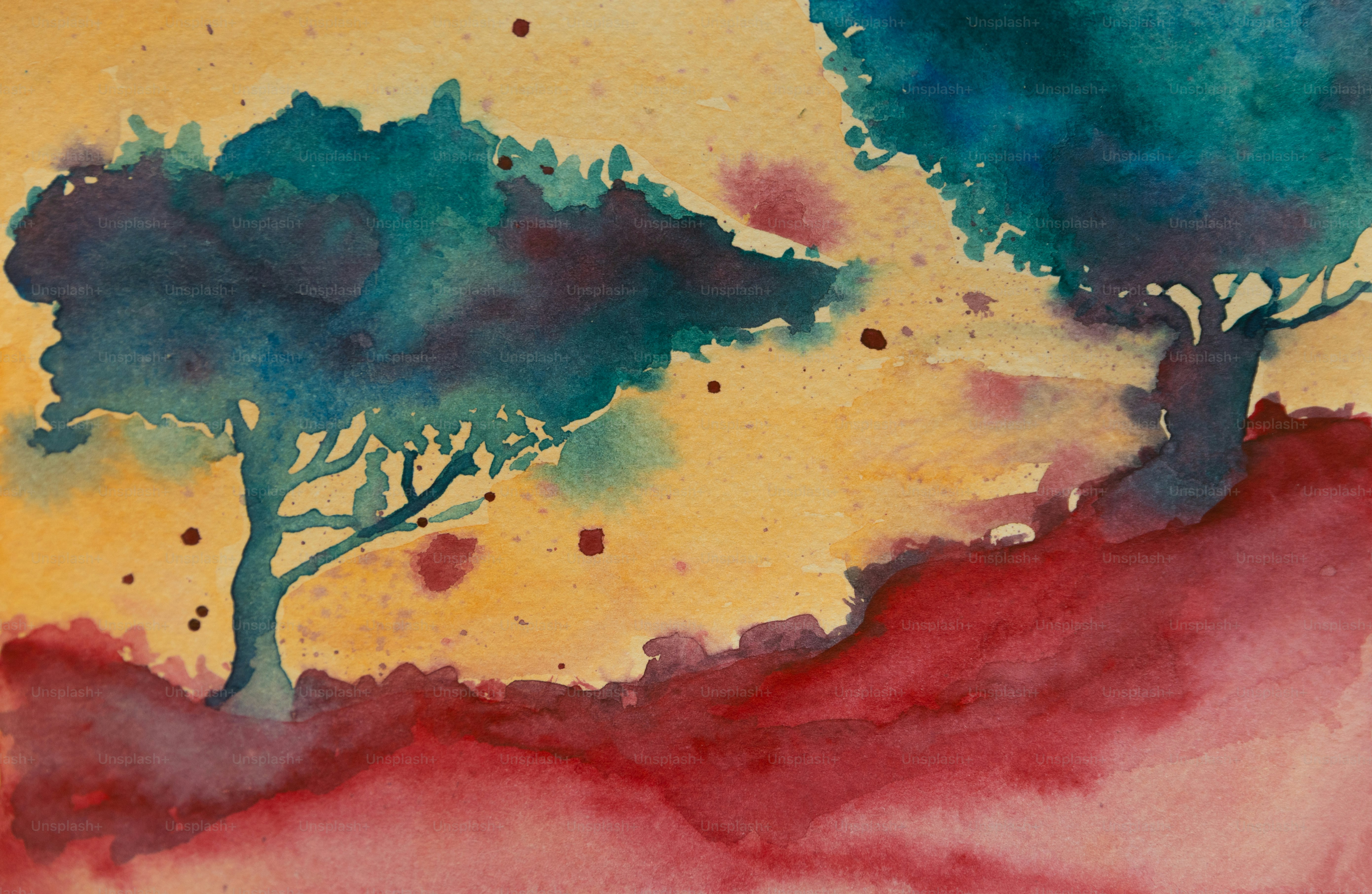 Two watercolor trees stand against a fiery sunset.