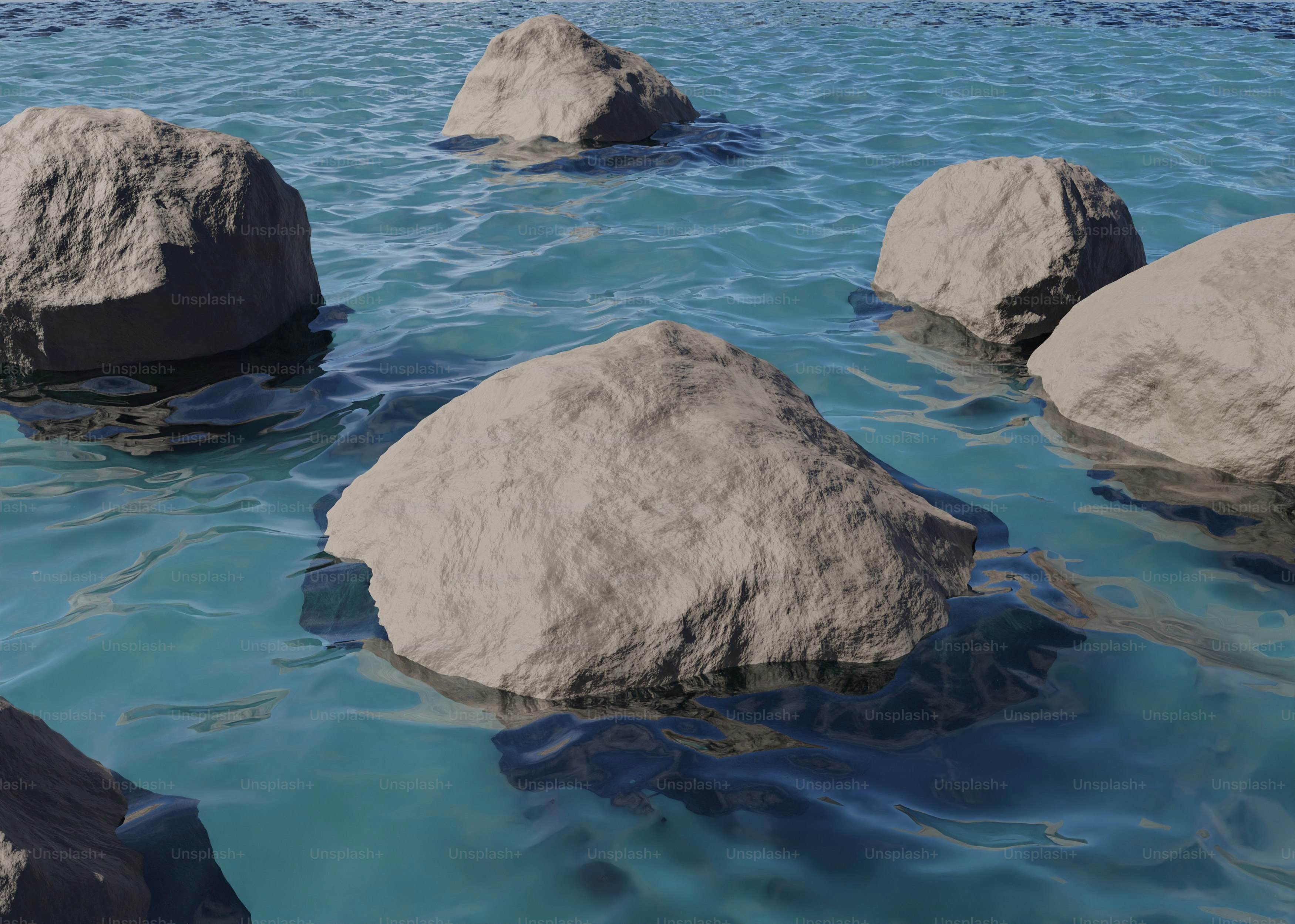 Rocks are scattered in serene, blue water.
