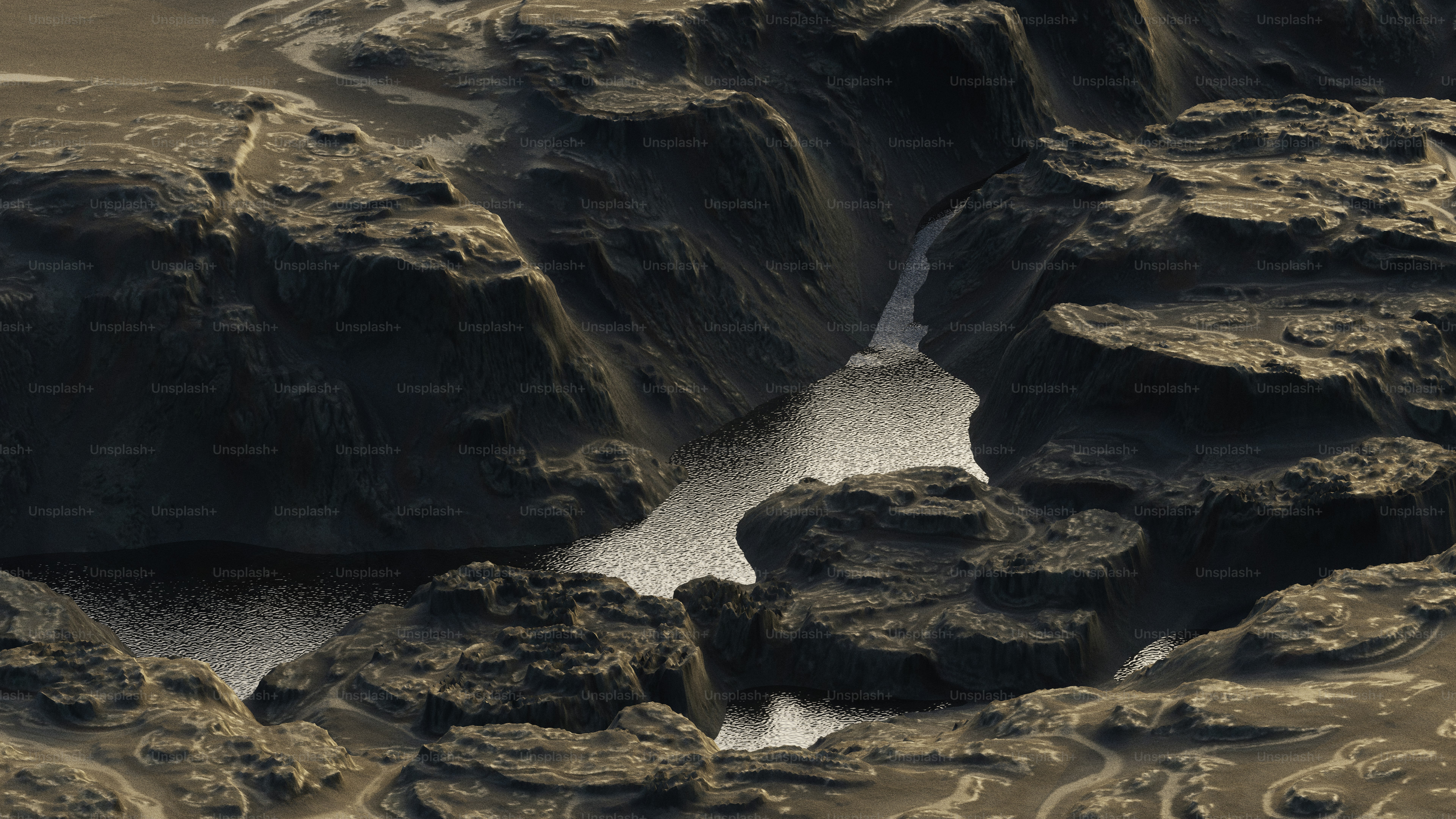 Rocky landscape with a narrow, water-filled crevice.