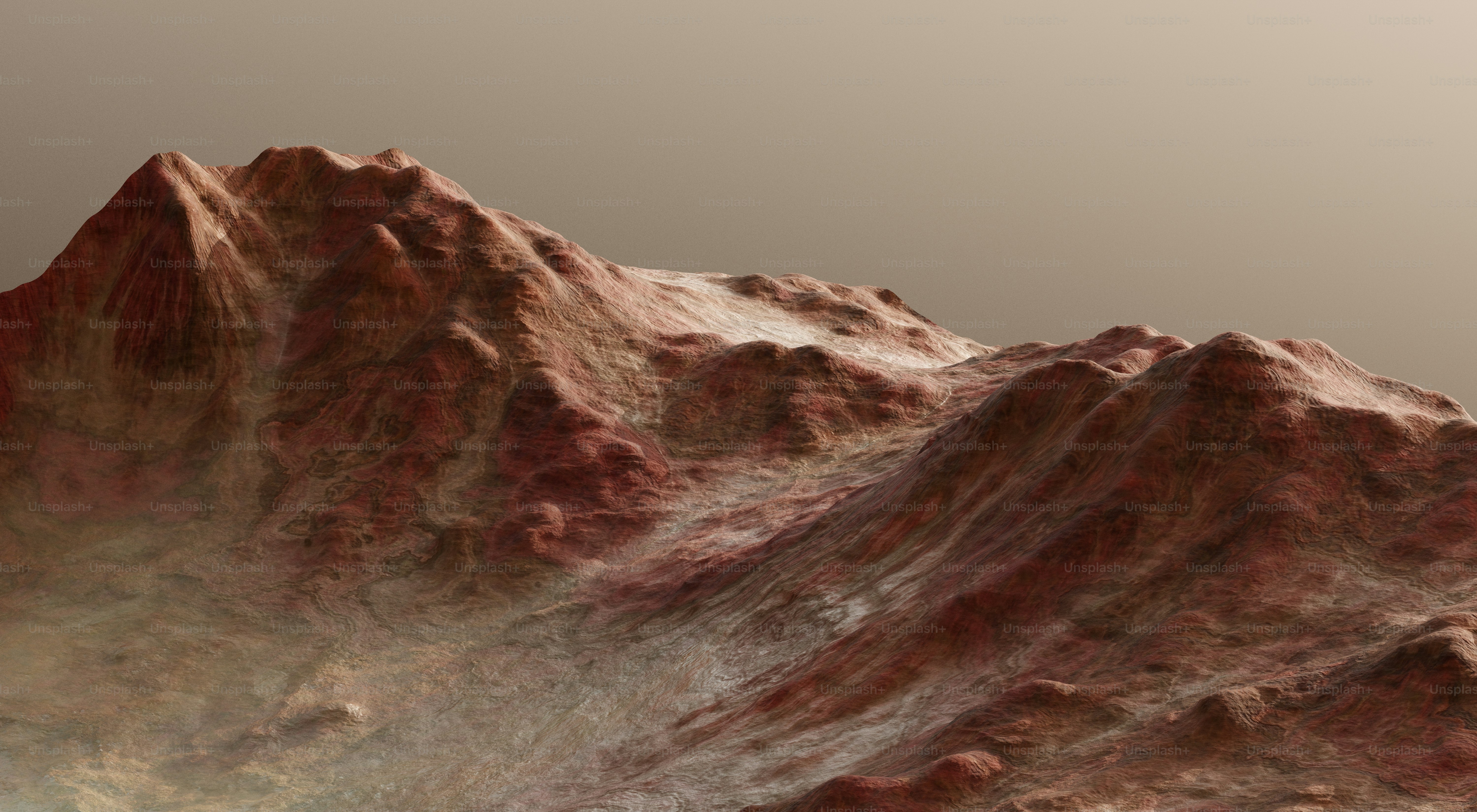 Red, rocky mountains against a hazy backdrop.