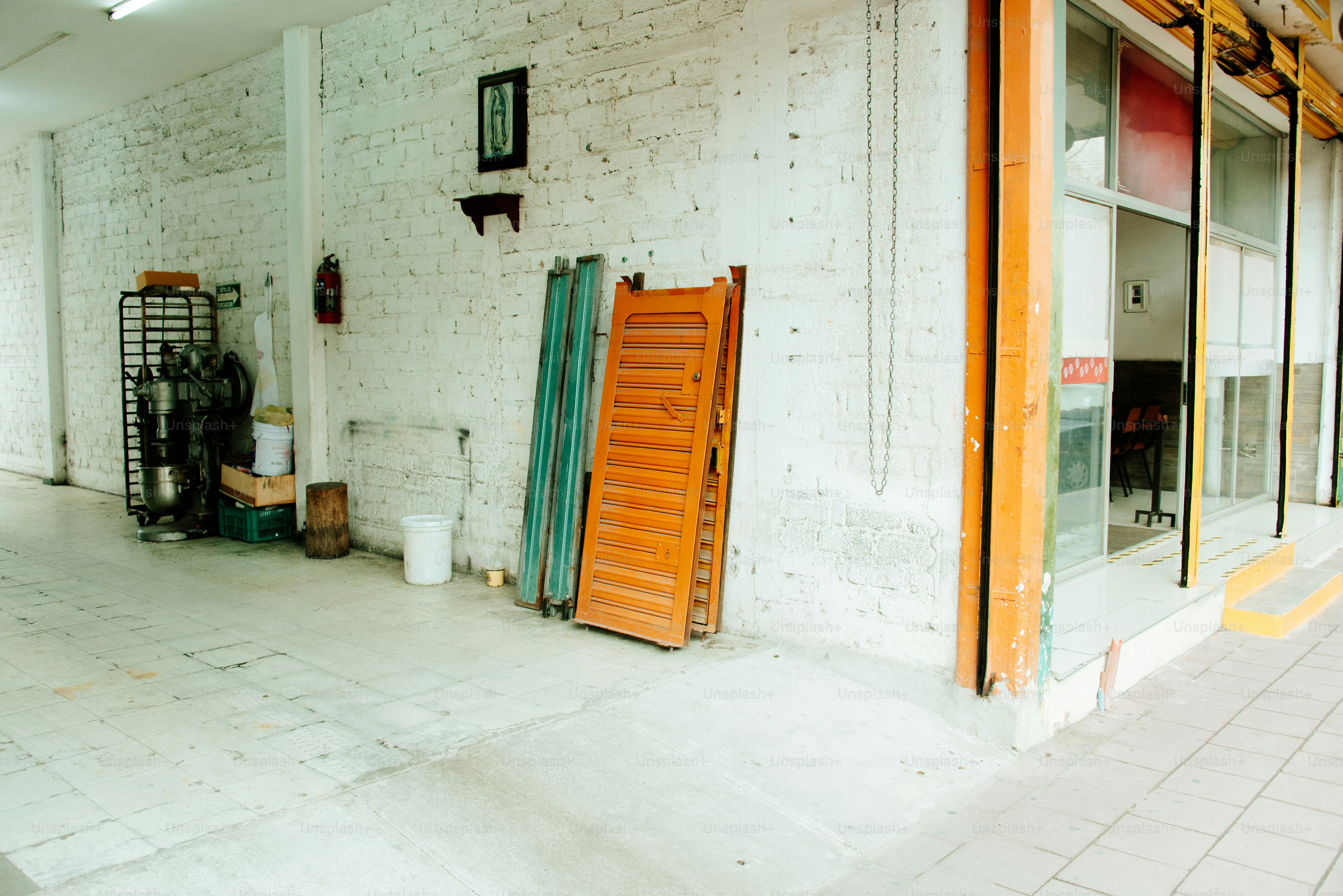 A storage room with doors and other items.