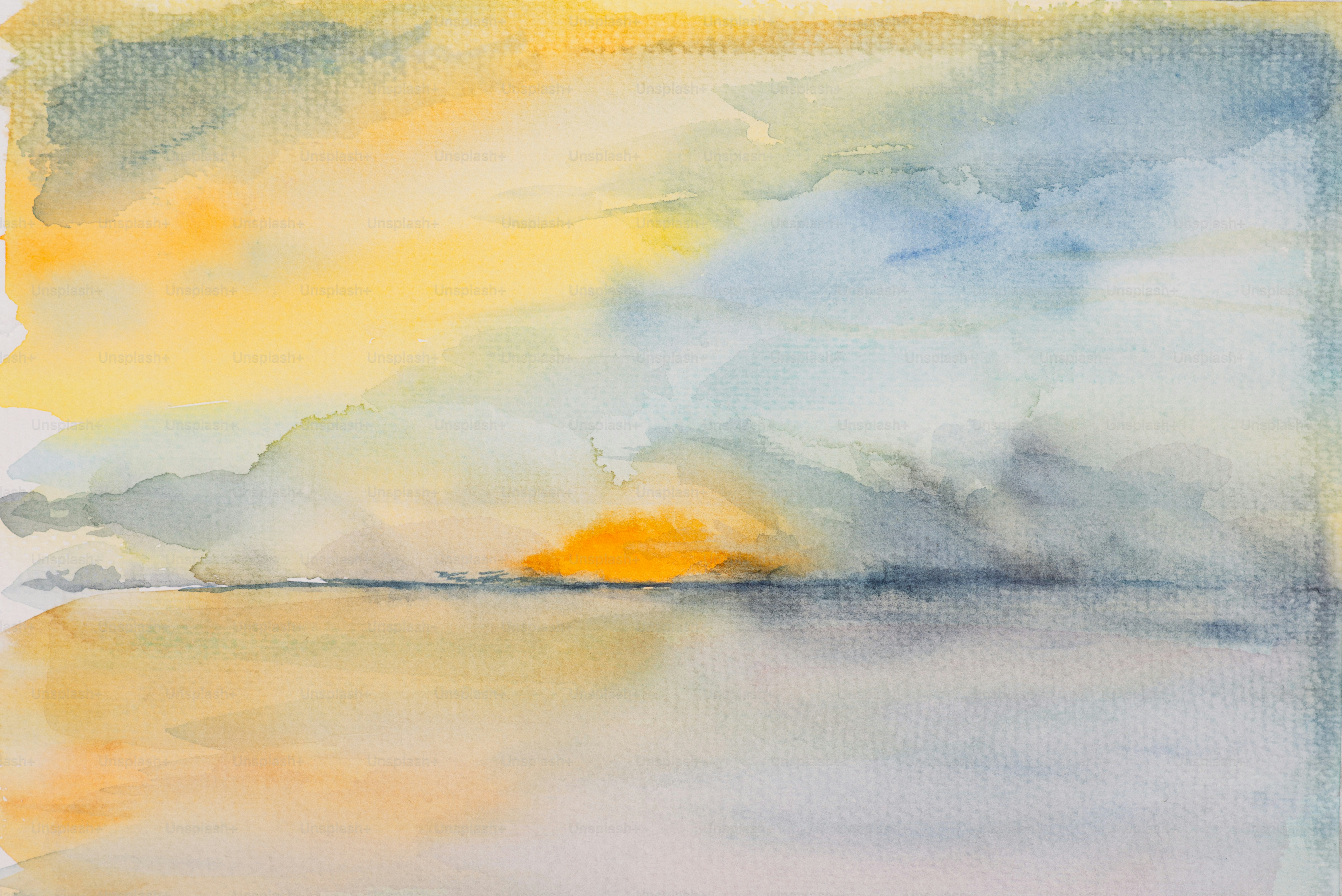 Aquarellmalerei eines bunten Sonnenaufgangs über Wasser.