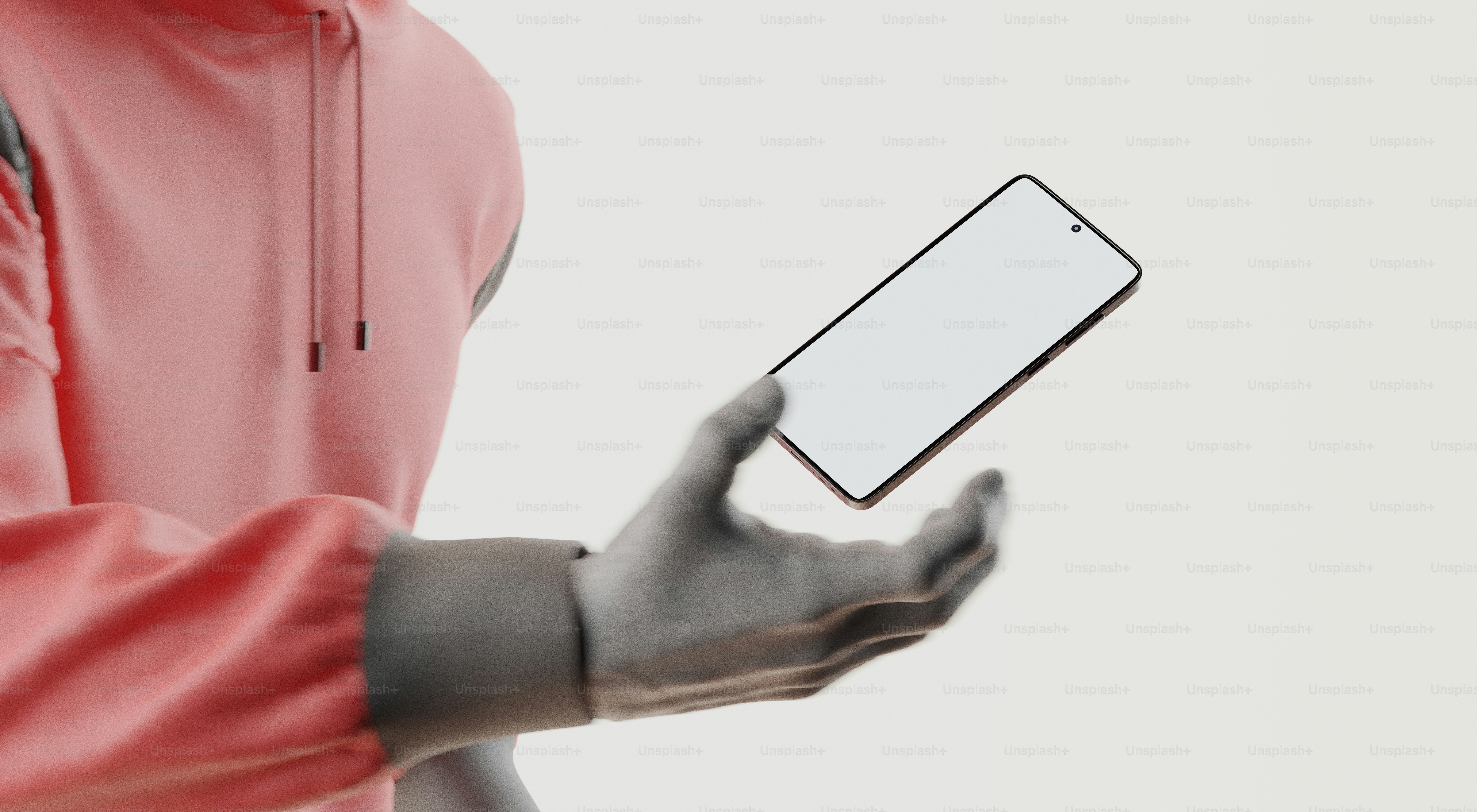 A person holds a phone in their hand.