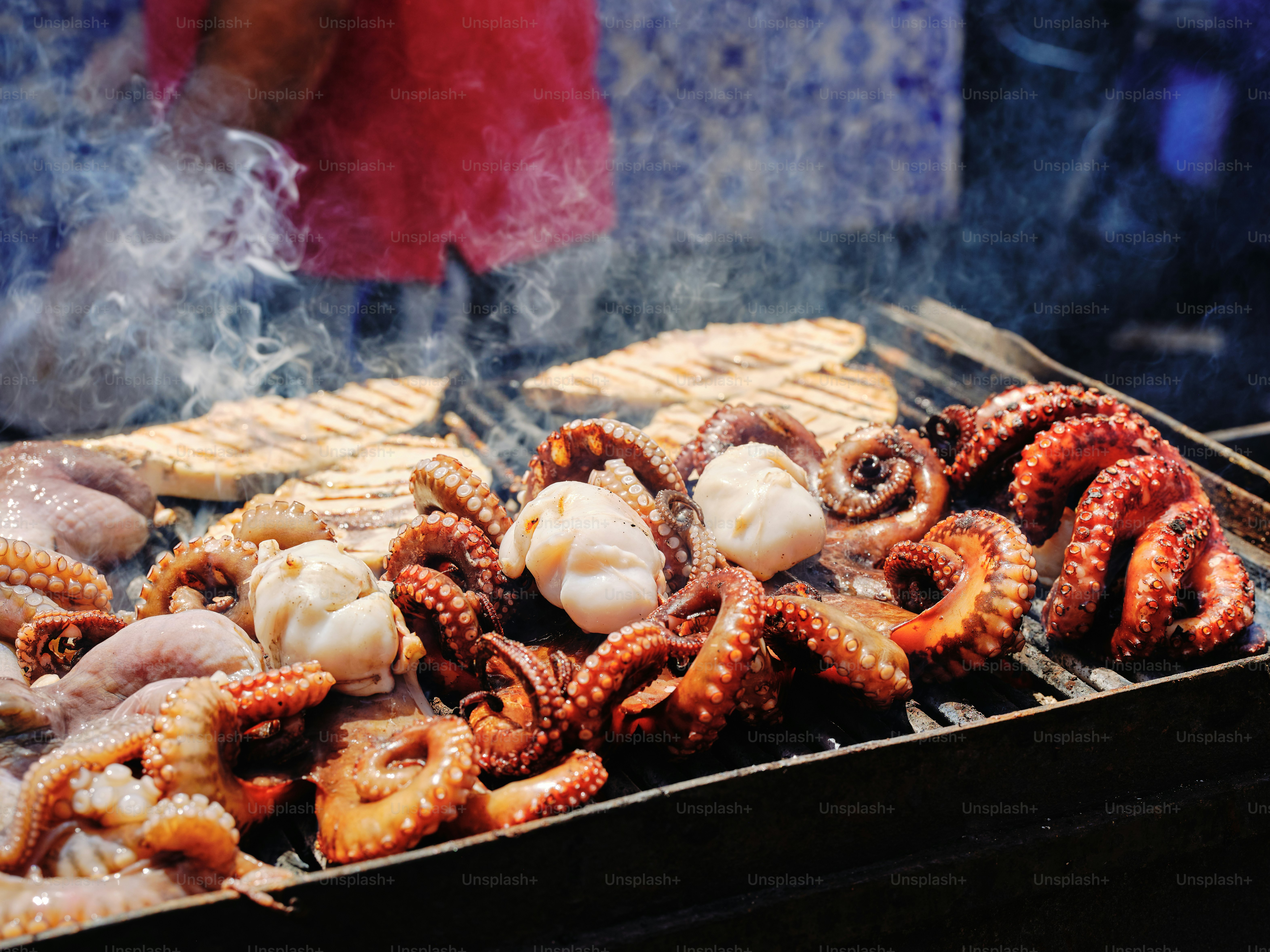 Grilled octopus and seafood look delicious.