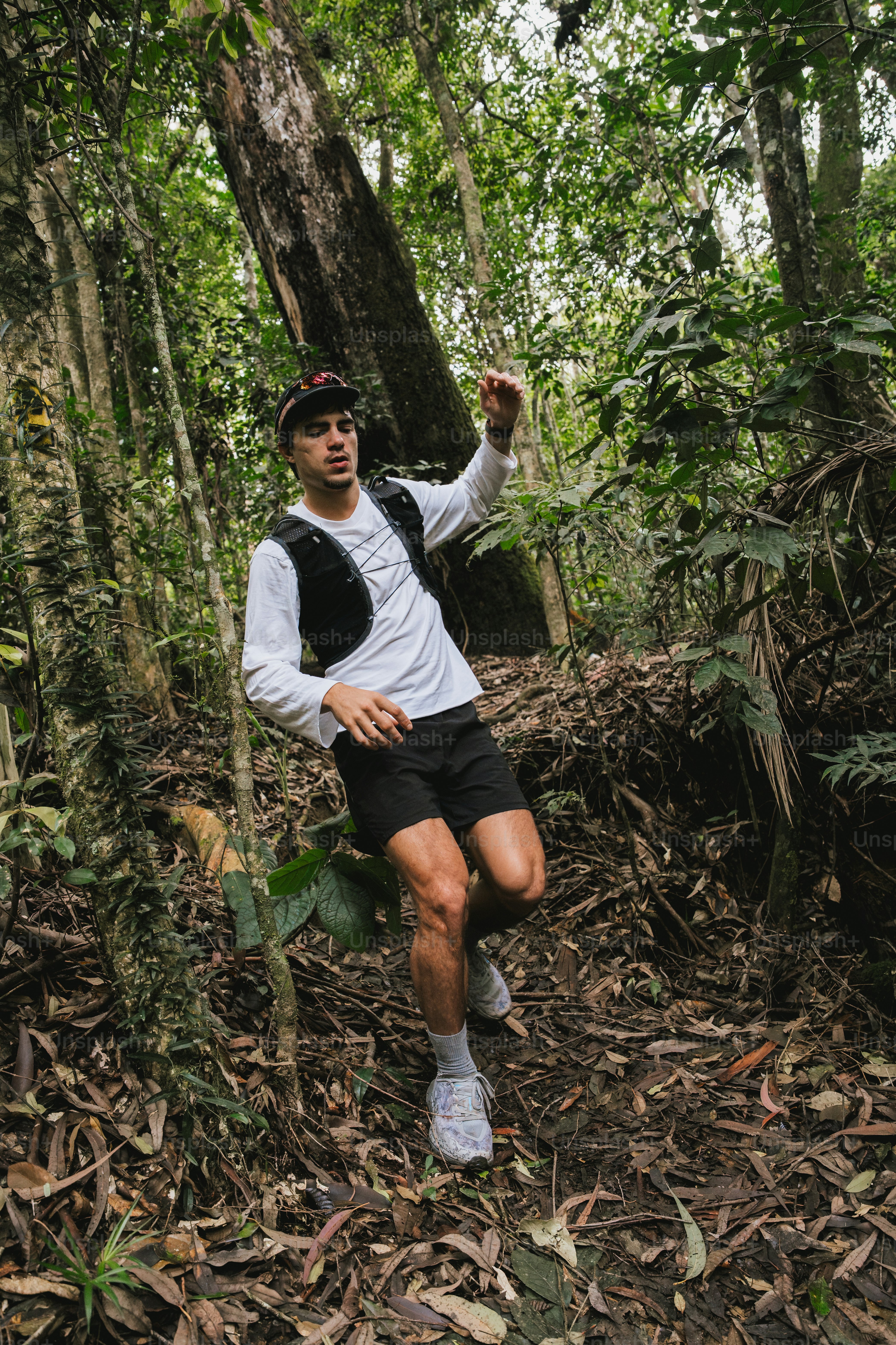 Athlete leaps through the air with great stride. photo – Sport Image on ...