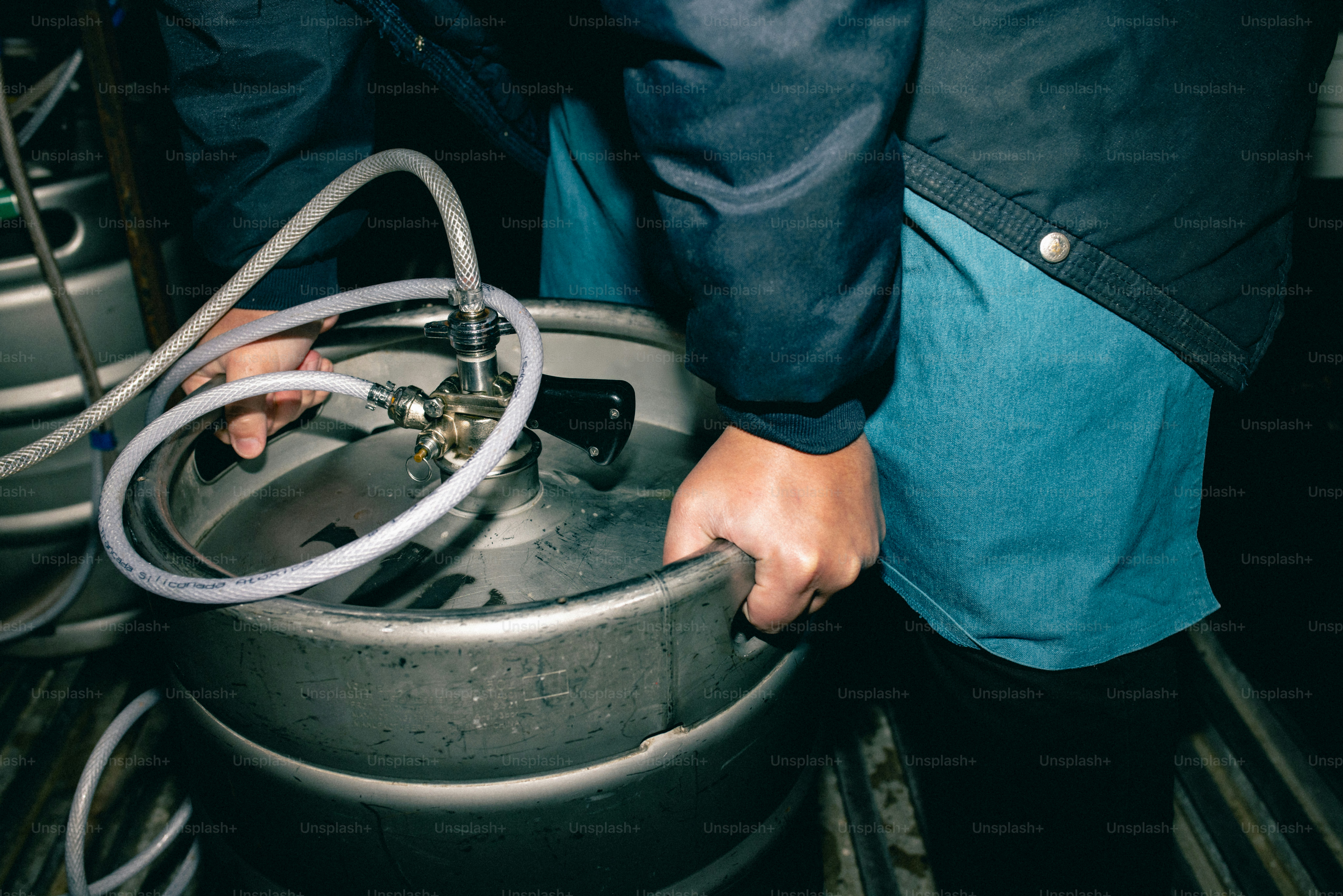 Someone is connecting a keg.