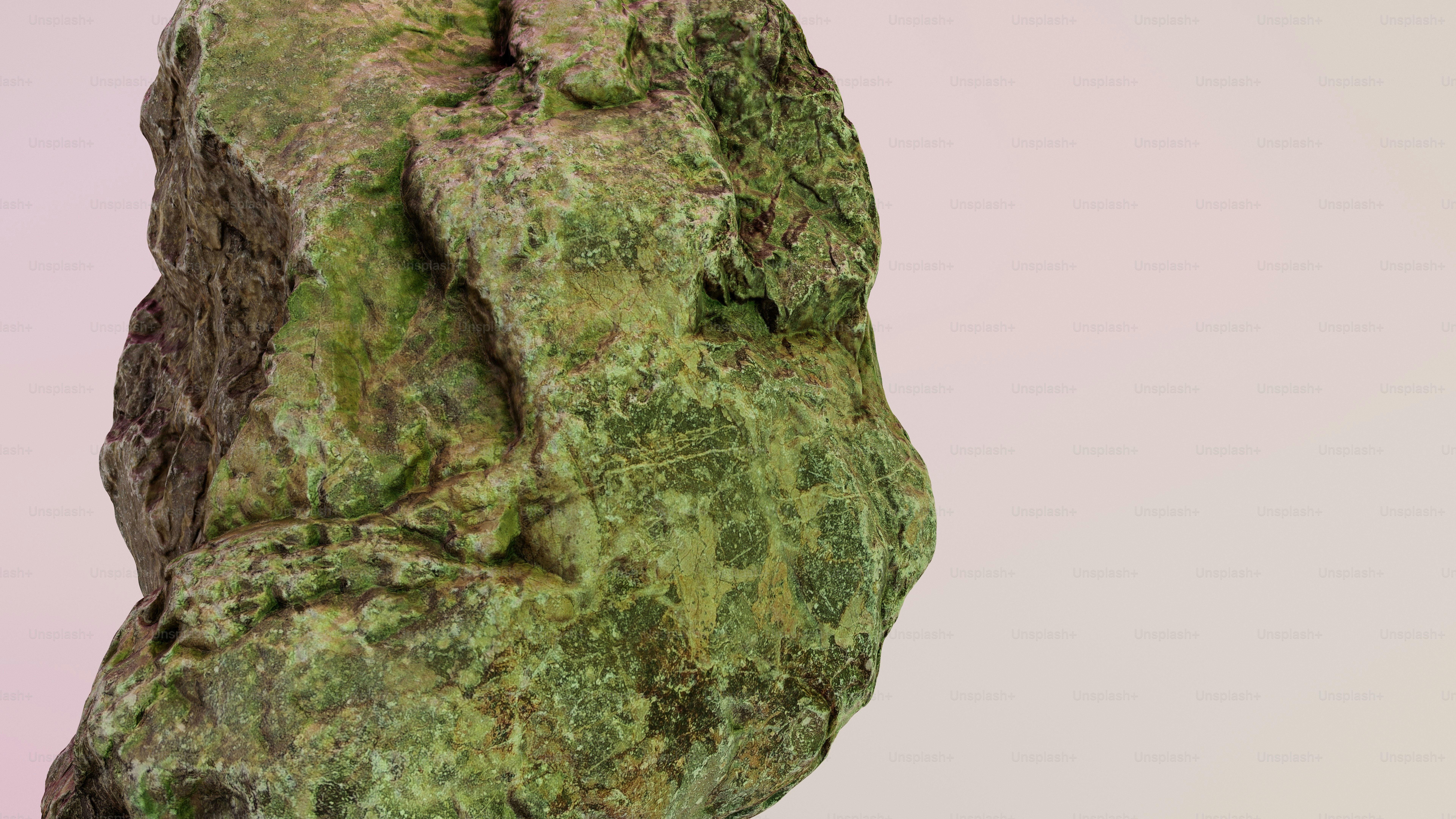 Un primo piano di una roccia verde.