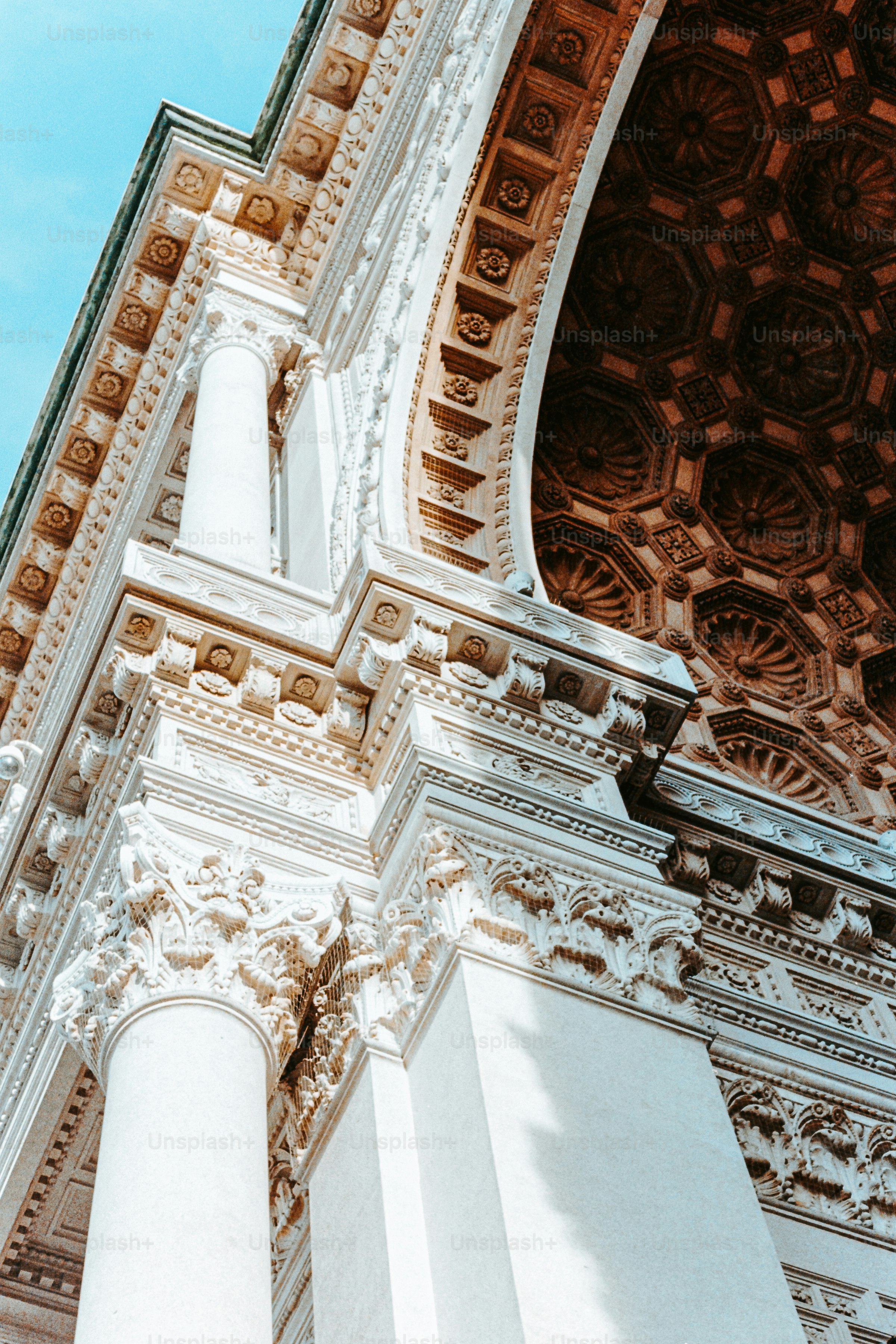 Ornate architecture details against a bright sky.