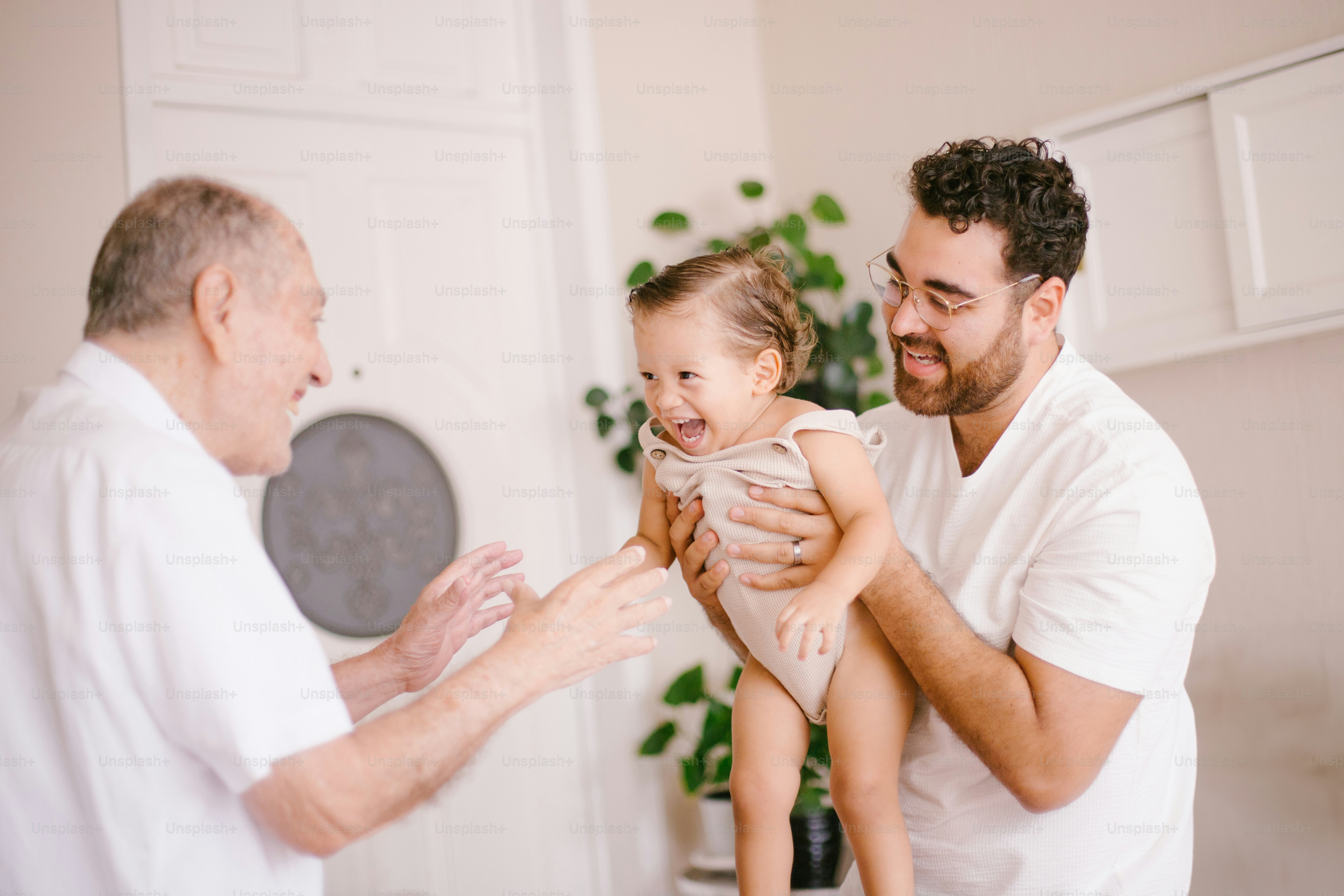 A father, grandfather, and child share a moment. photo – Family Image ...