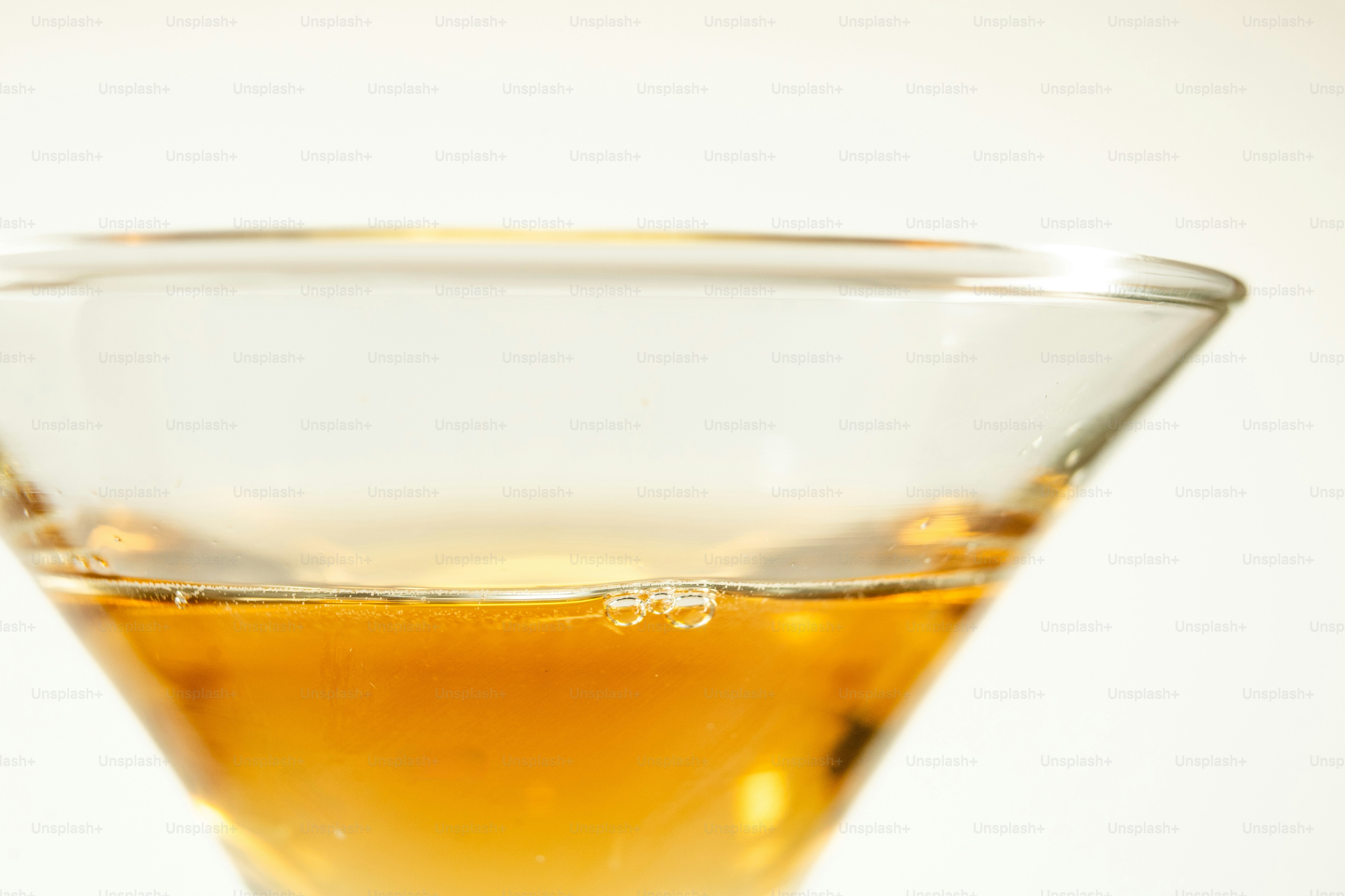 Liquid and bubbles inside a transparent bottle. photo – Minimalist ...