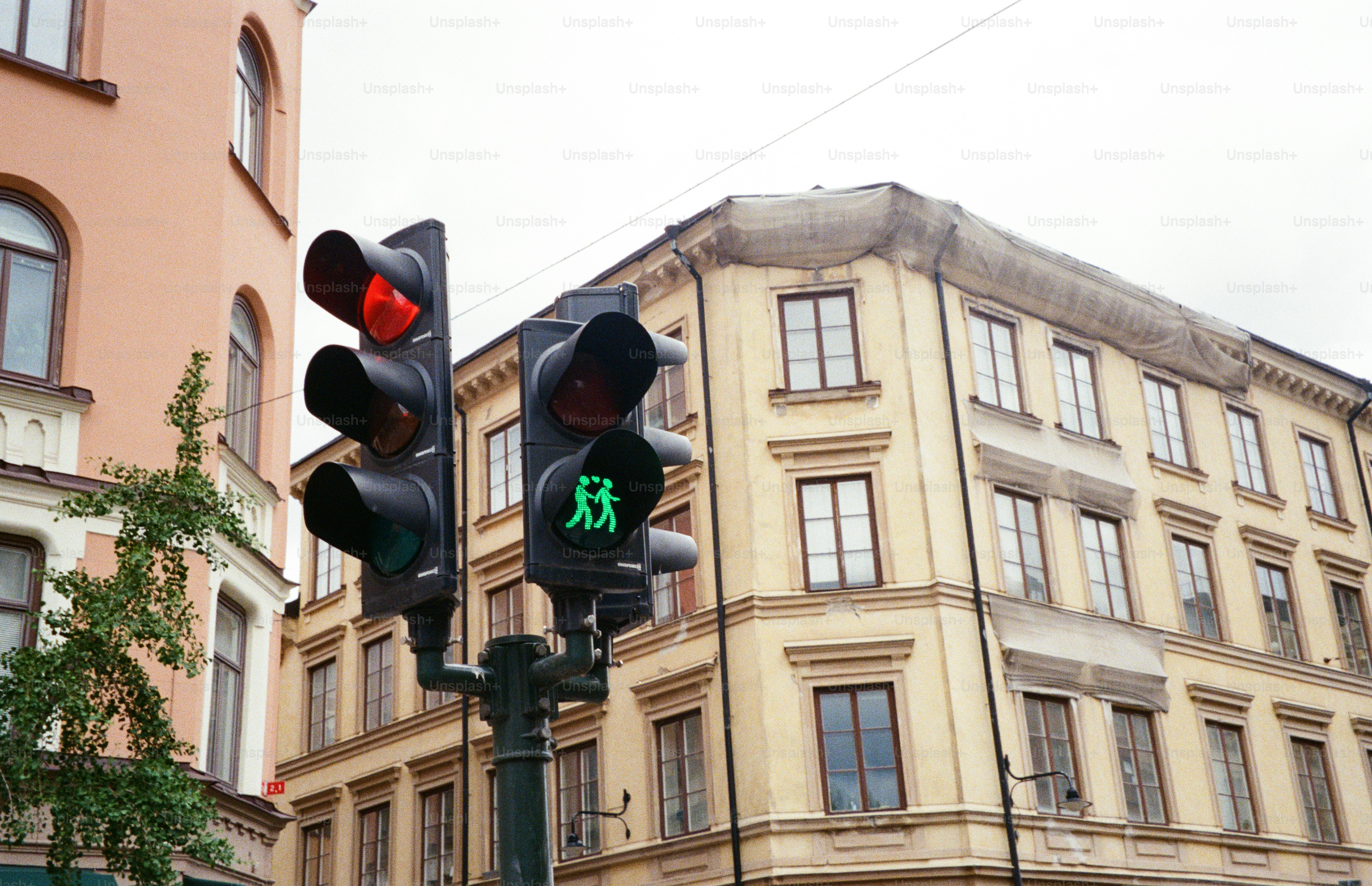 The traffic light shows green for pedestrians.