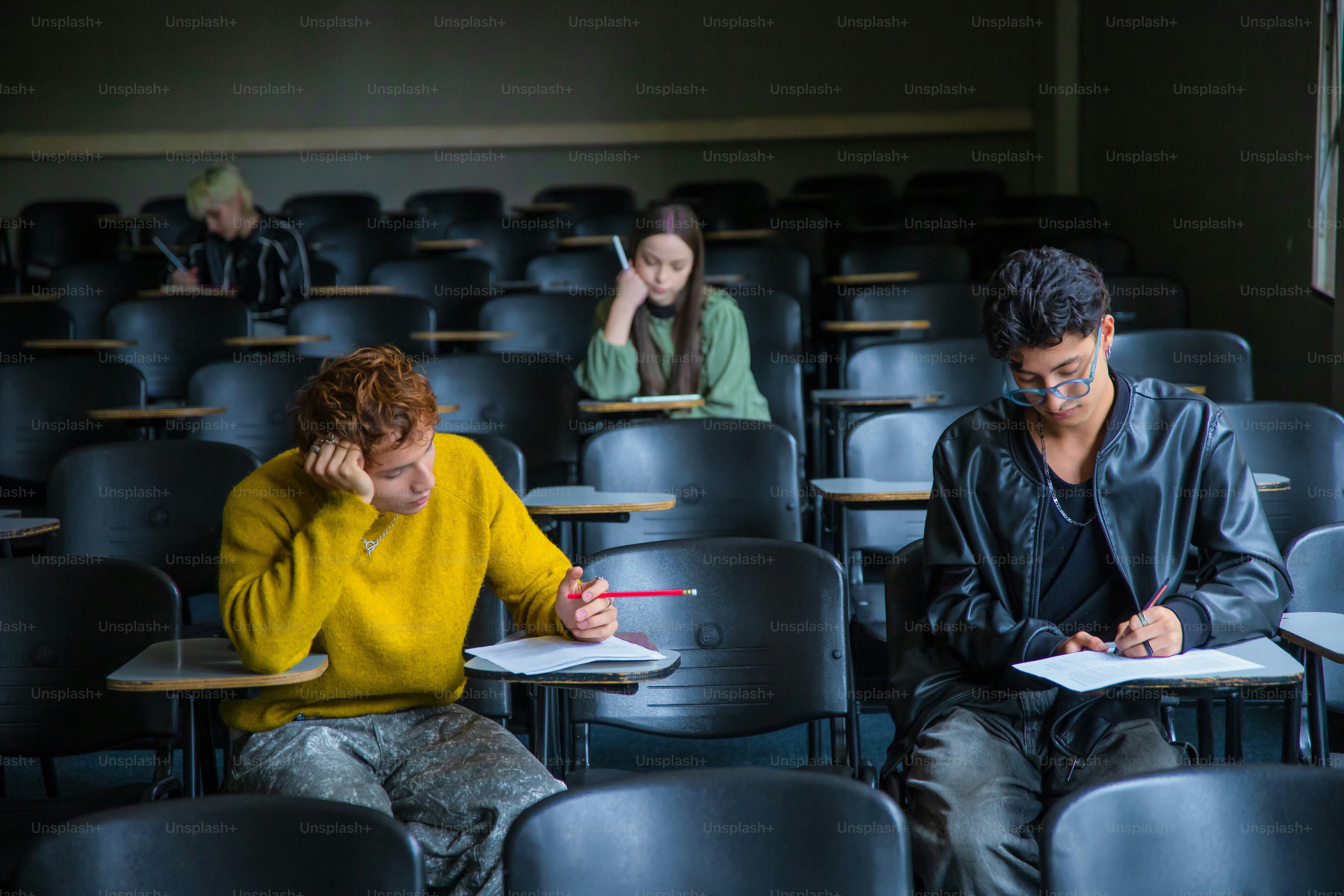 Students are focused and working on an exam.