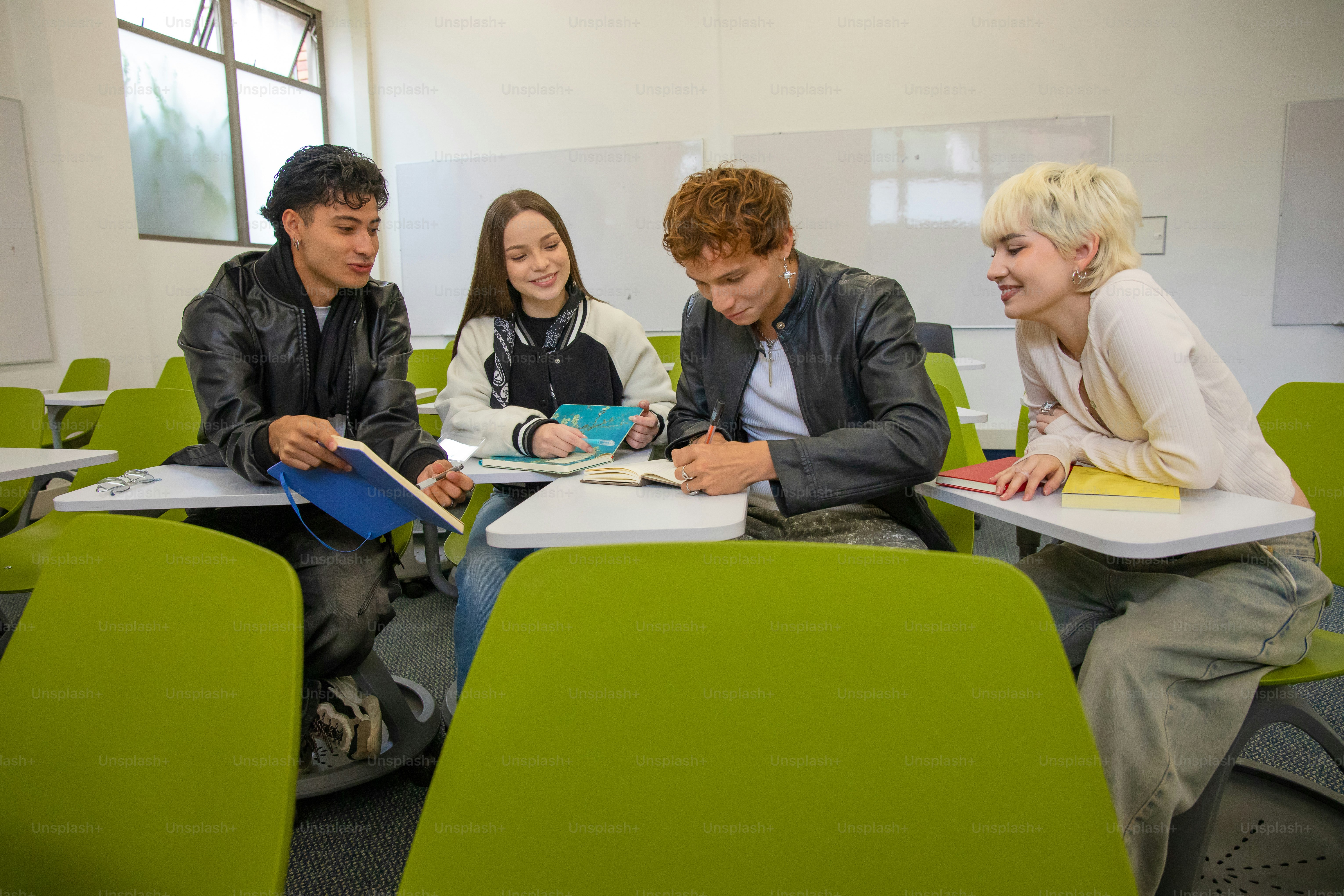 Students collaborate on a project in a classroom.