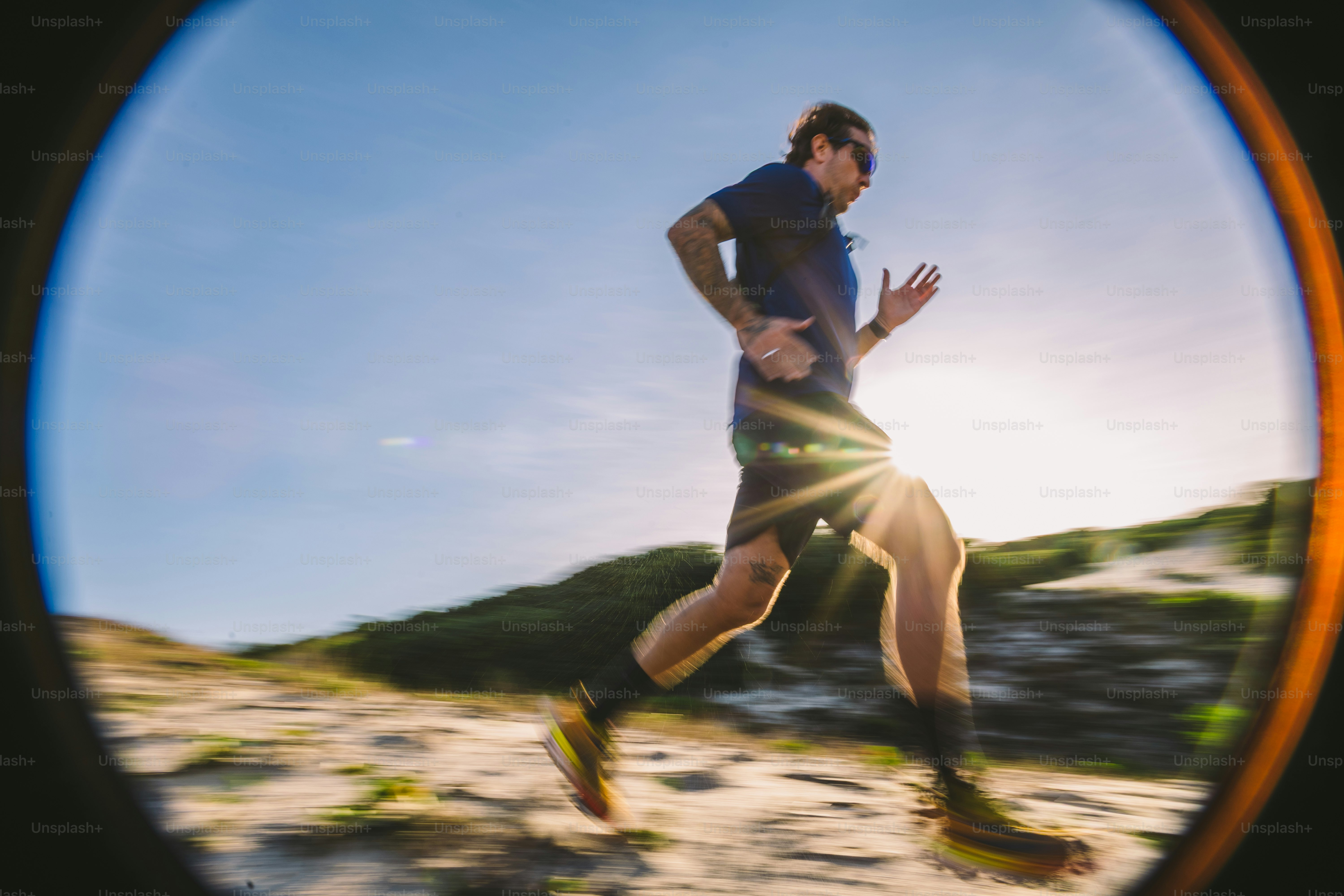 A runner exercises outdoors on a sunny day.