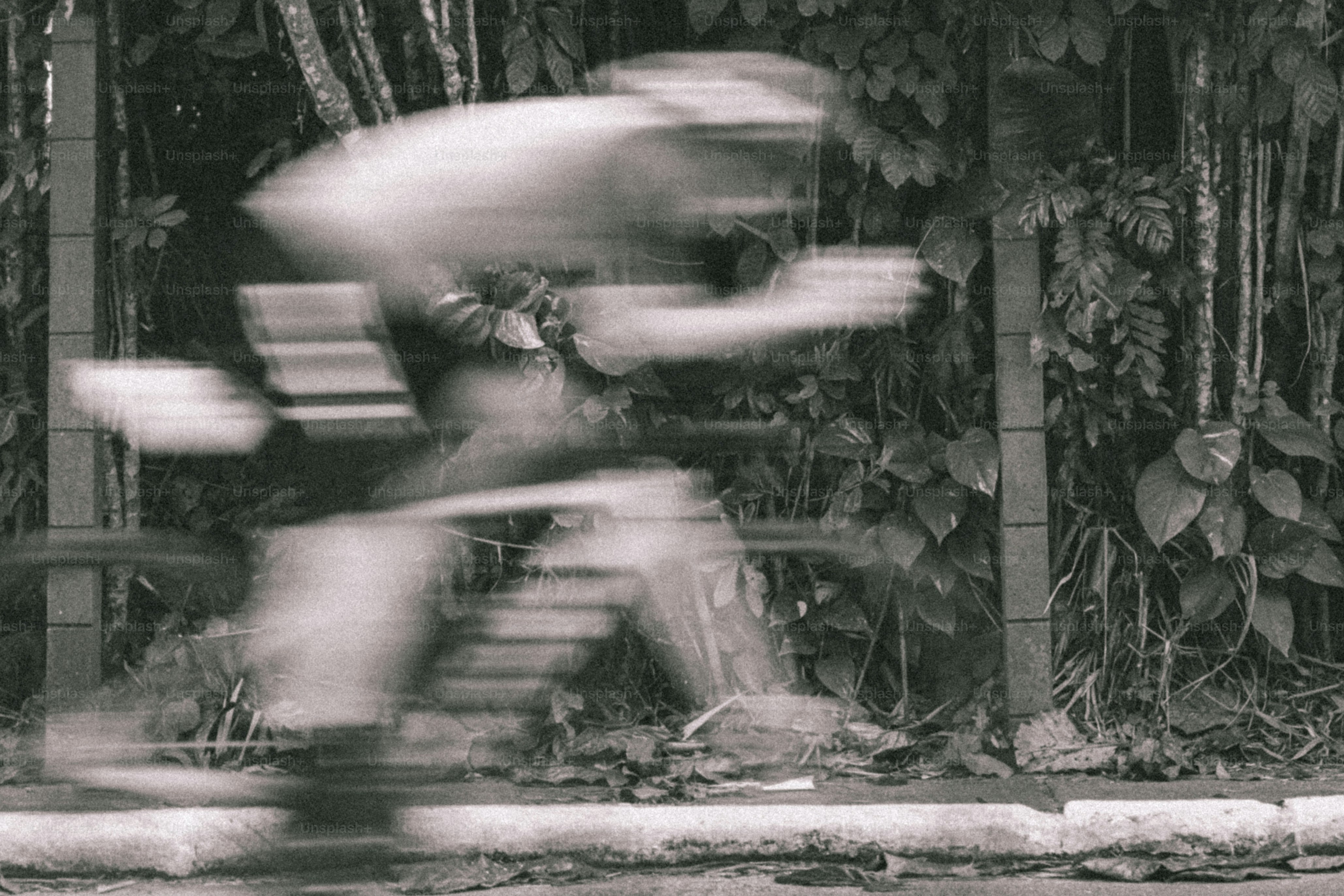 Blurry image captures a person in motion.