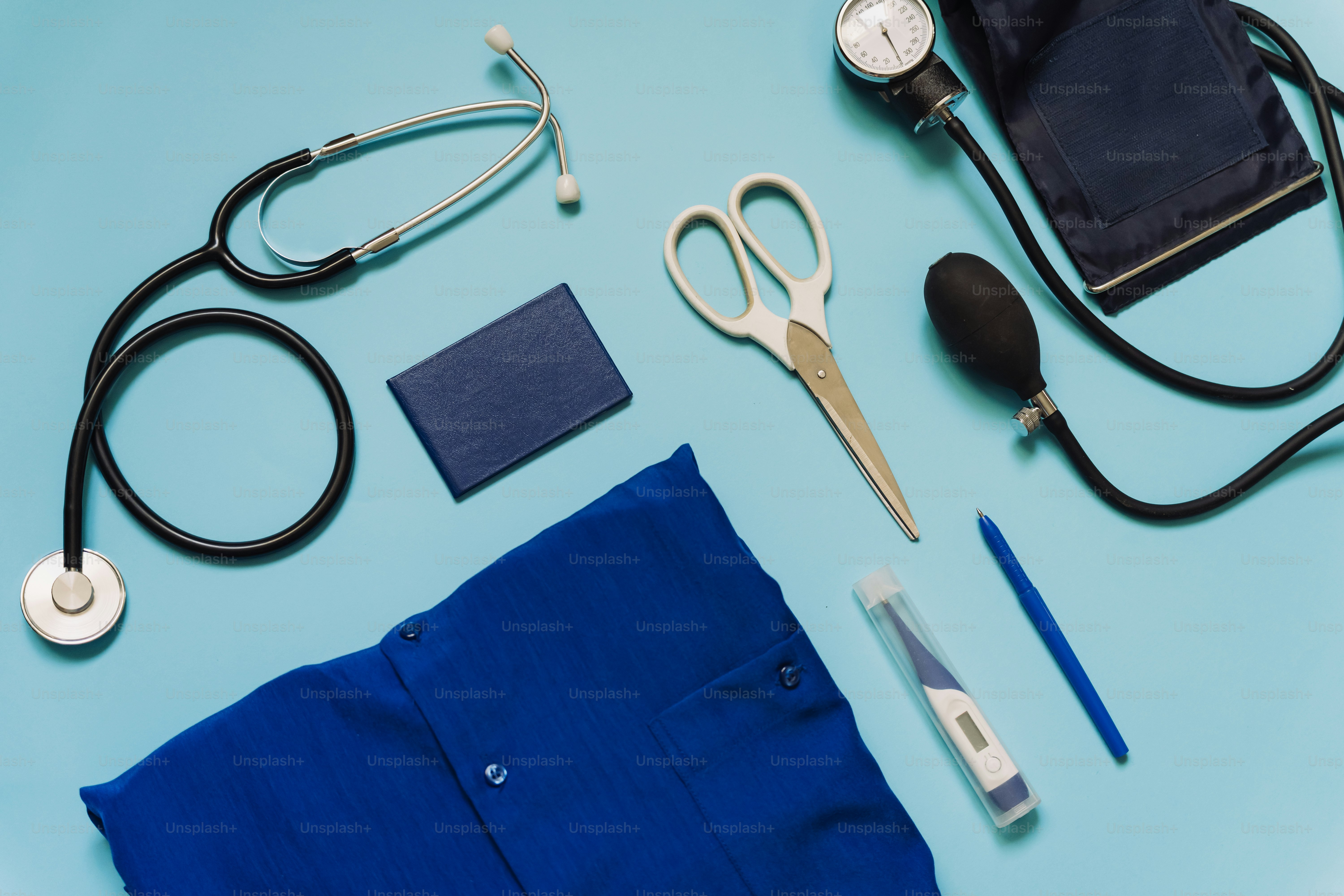 Medical tools are neatly arranged on a blue surface. photo – Fashion ...