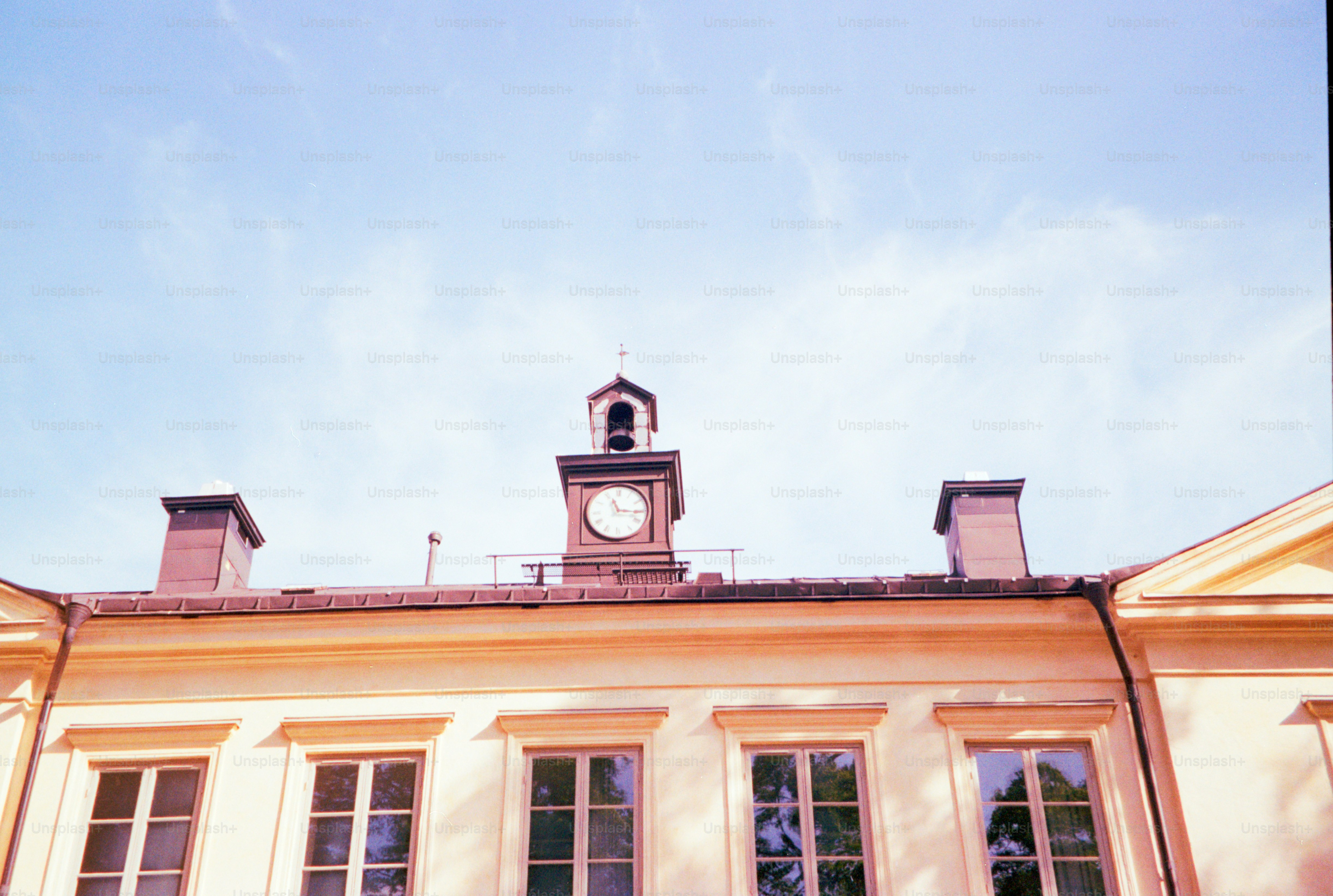 The building features a clock tower and windows.