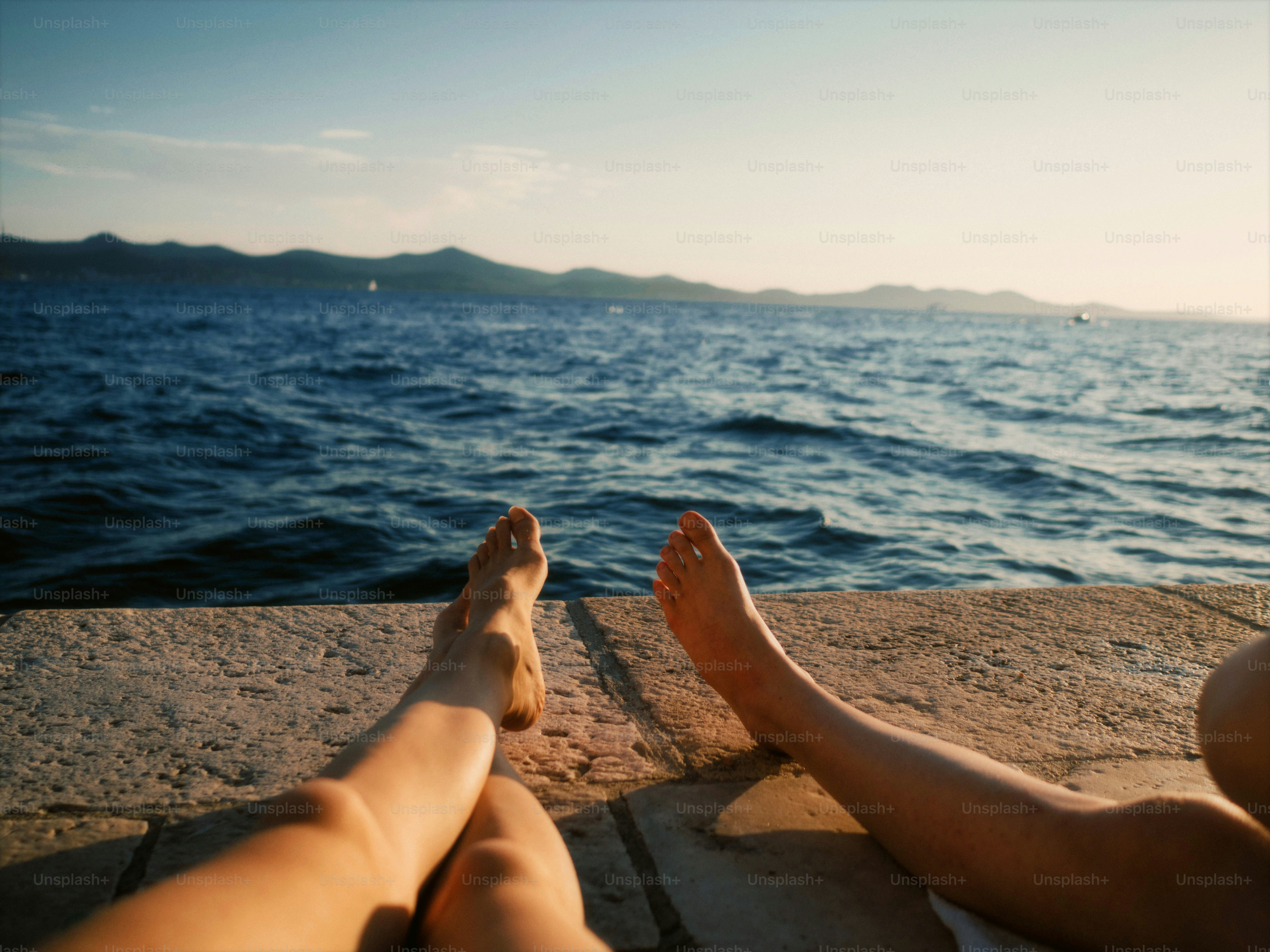 Relaxing by the sea, enjoying a sunny day. photo – Sea Image on Unsplash