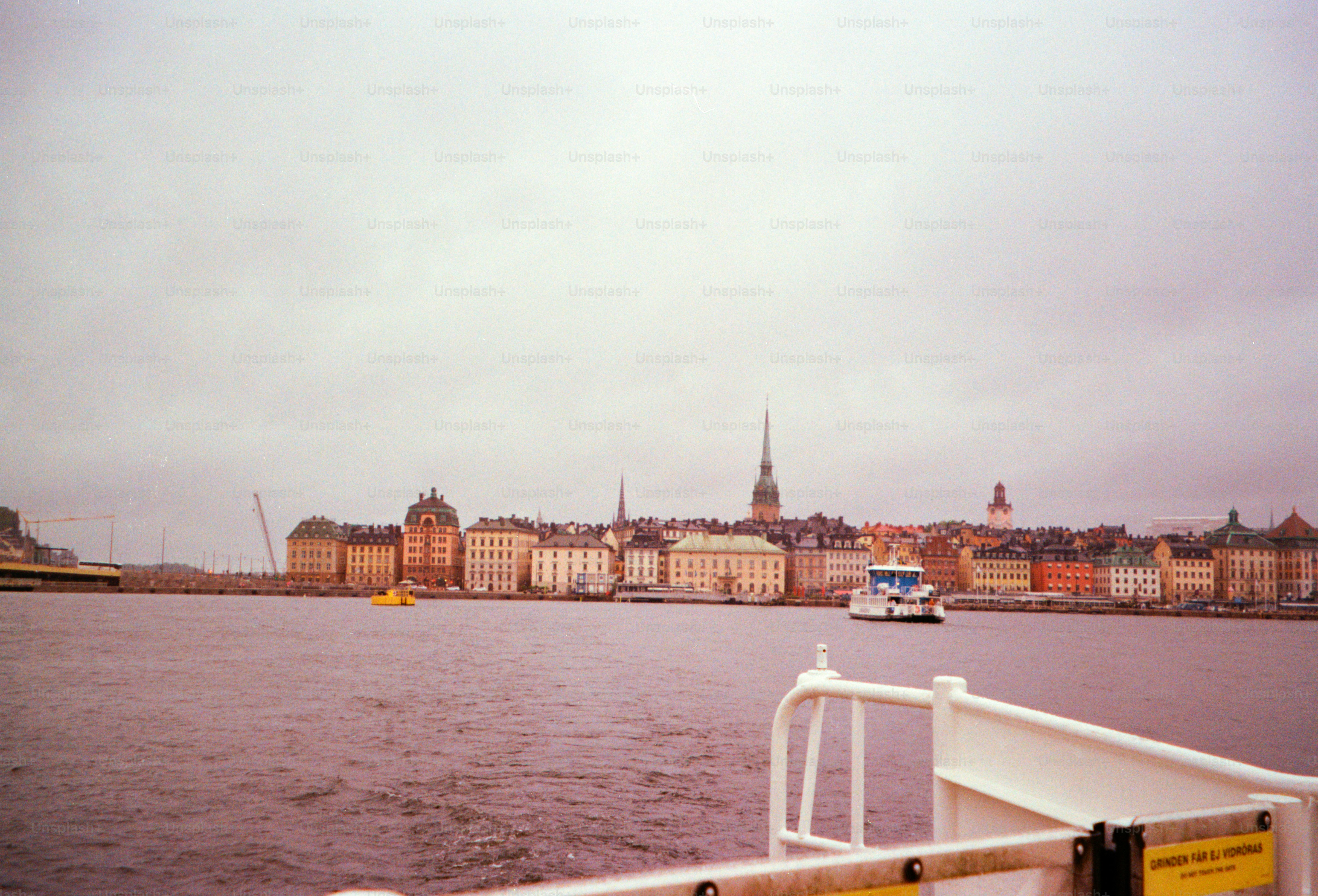 A scenic view of a city by the water.