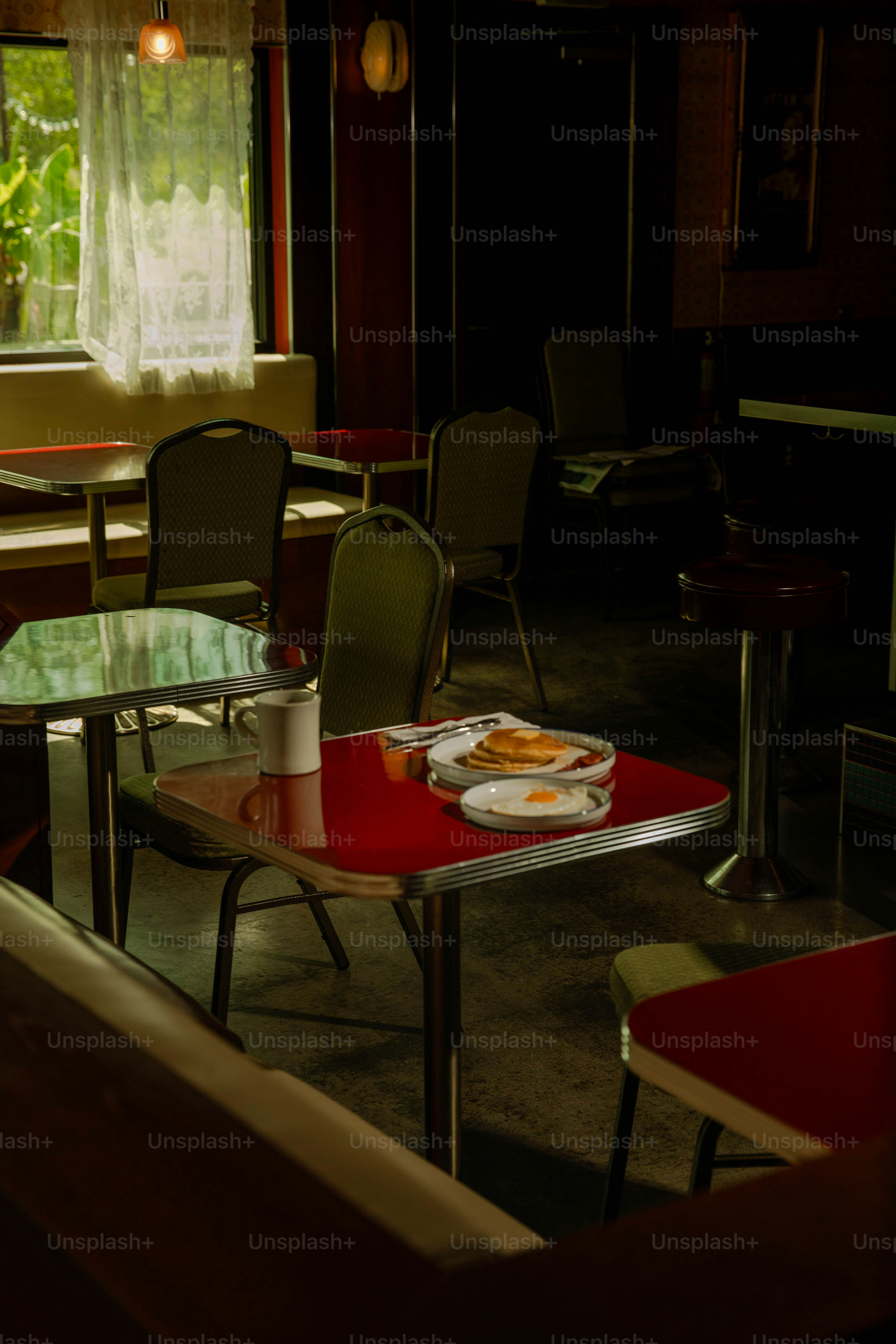An empty diner booth awaits customers' return.