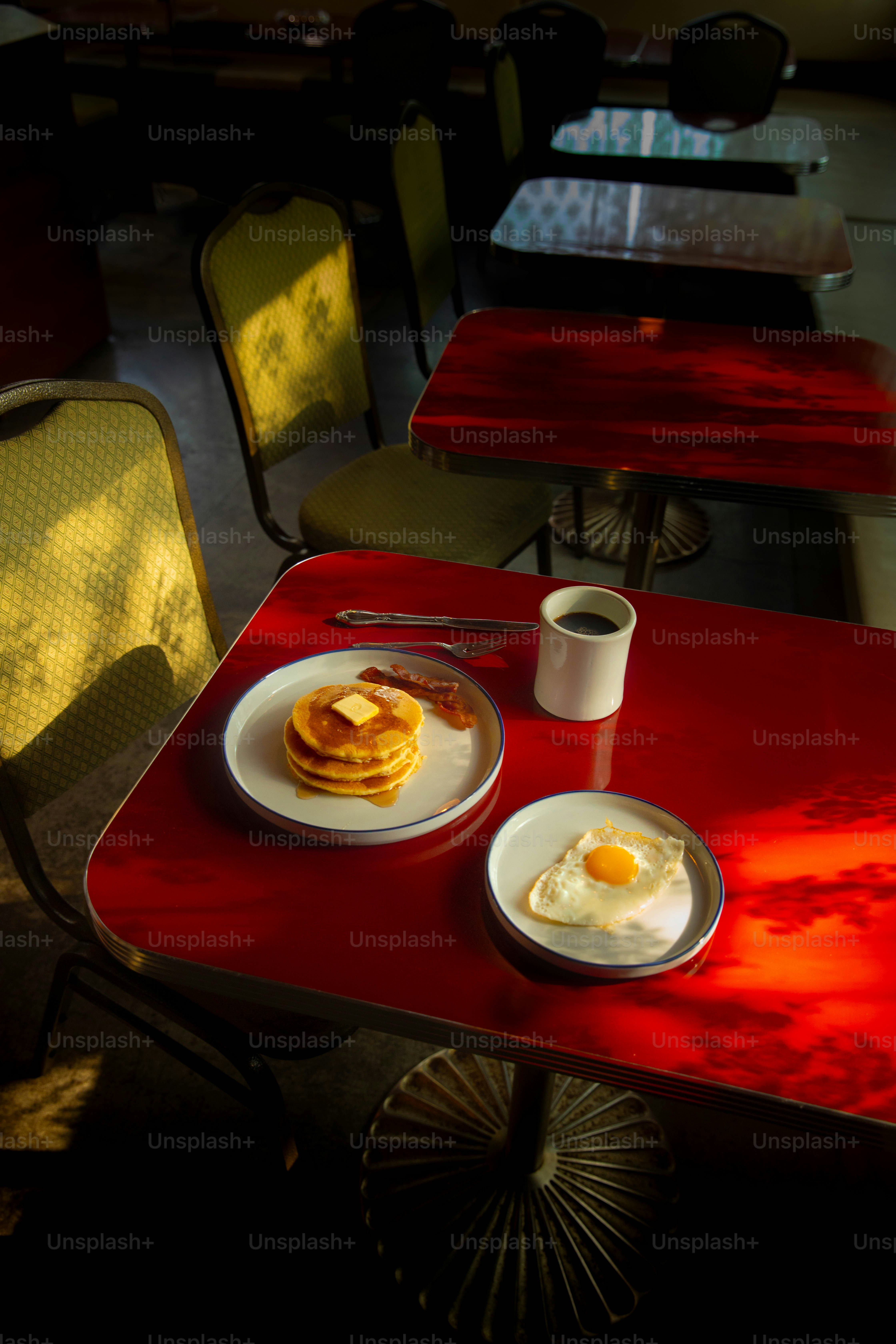Breakfast is served on a diner table.