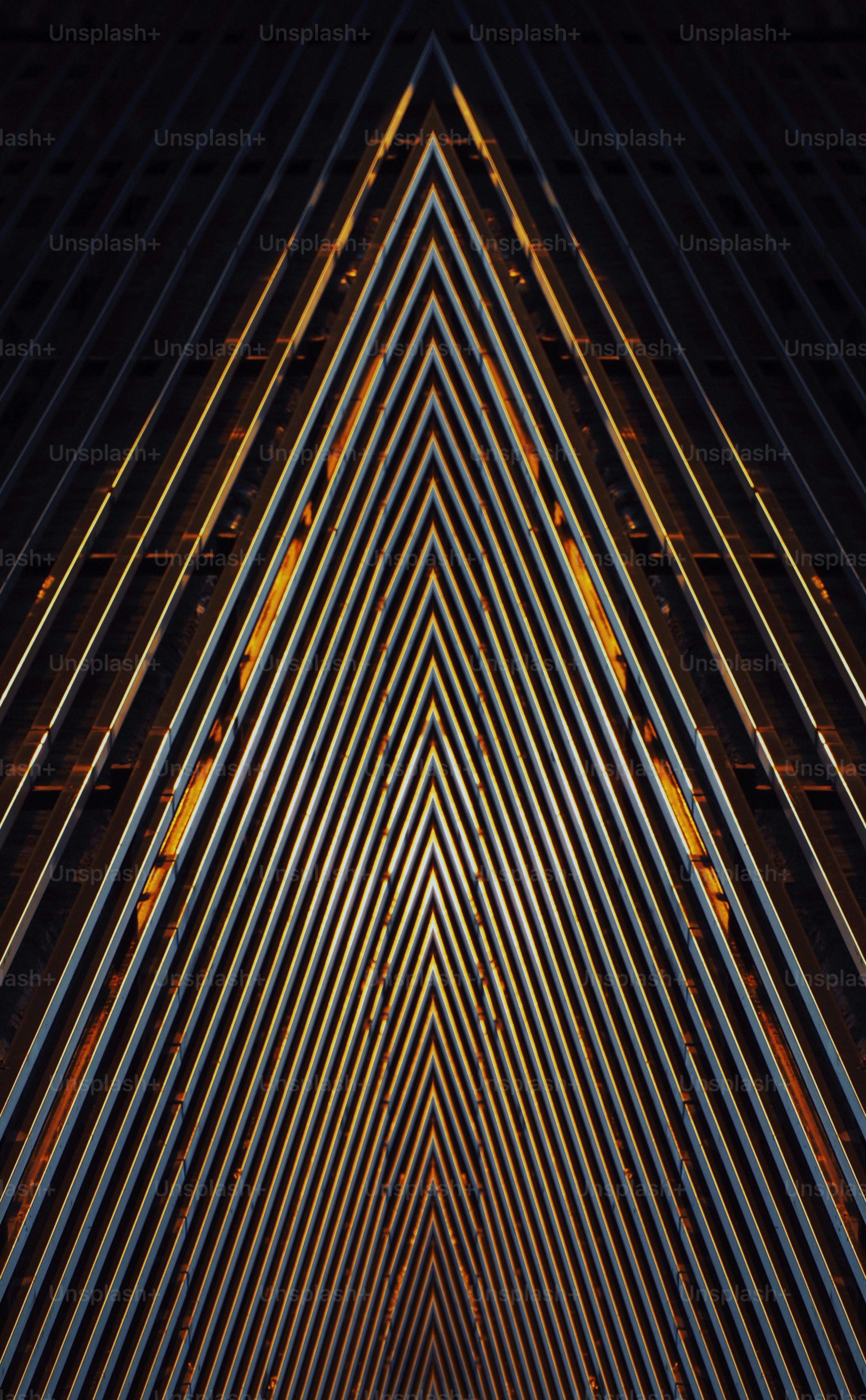 Abstract geometric pattern of converging metal lines