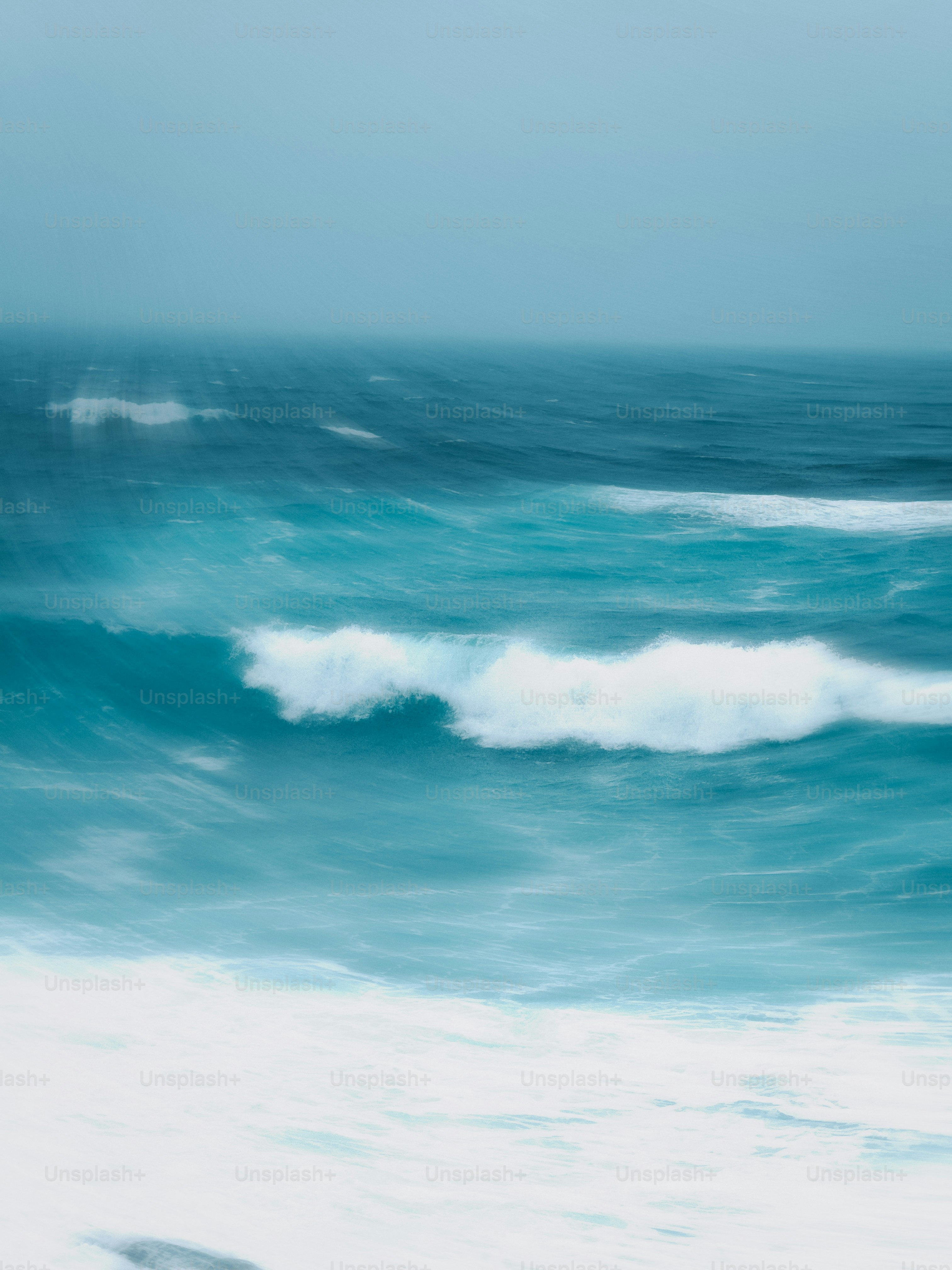 Waves crashing on the ocean.