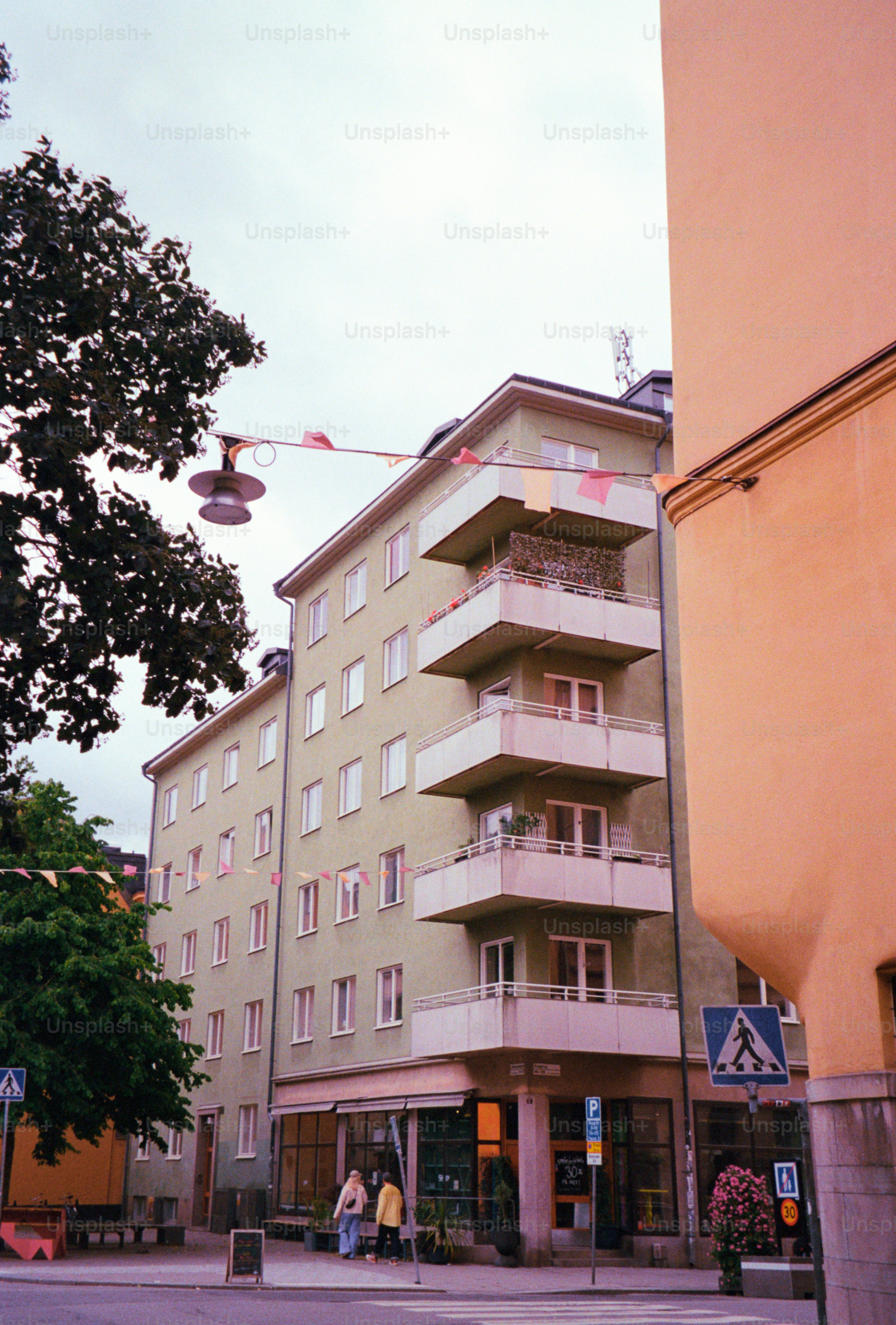 Apartment building with balconies on a city street