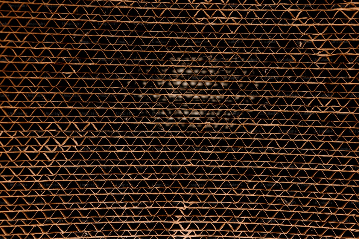 Macro close-up of corrugated cardboard showing flute structure