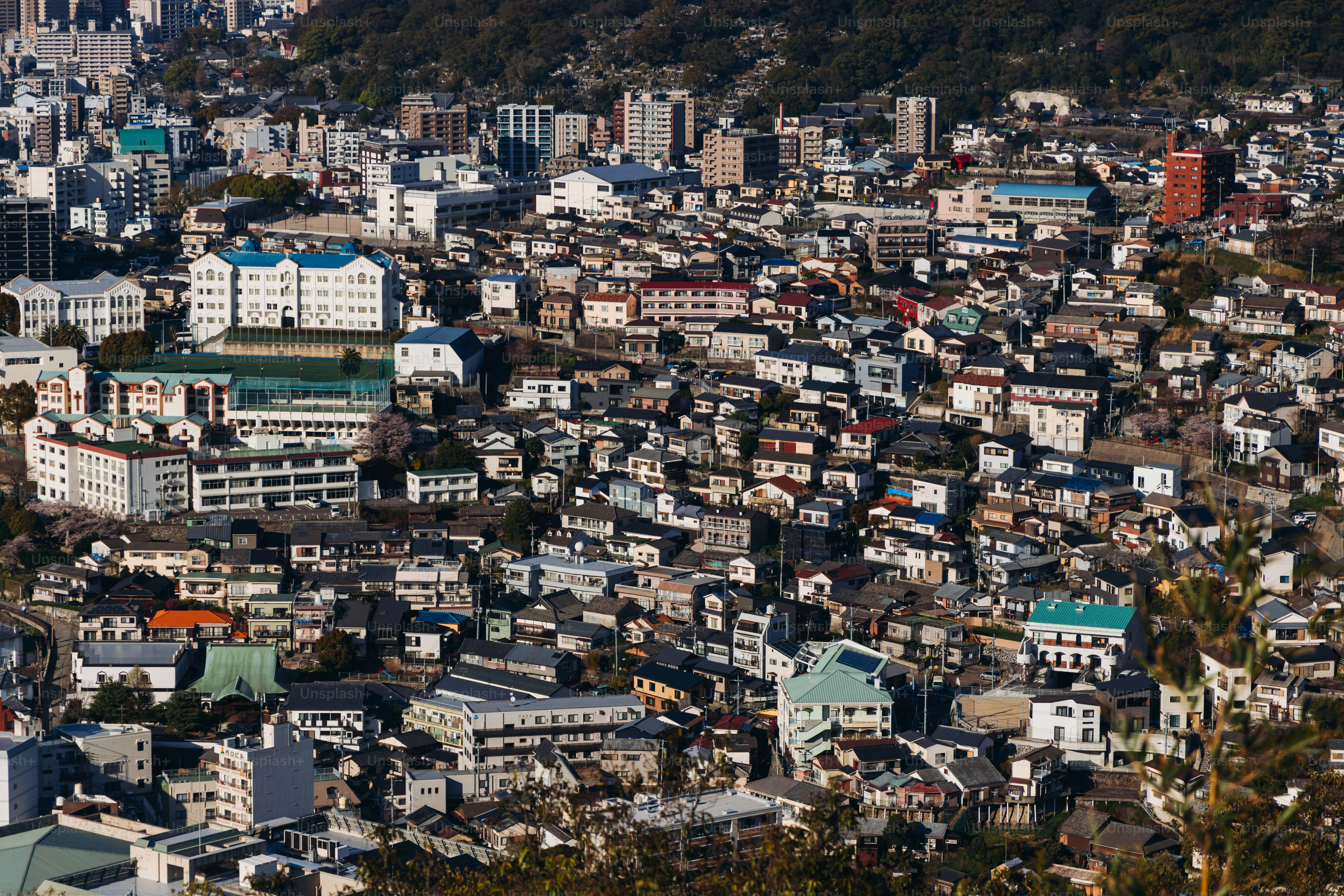Nagasaki panorama, Japan, beautiful aerial view, with city skyline, port and mountains, seen from Nabekammuri mount, in a spring sunny day with a blue sky, Nagasaki prefecture, Kyushu island region